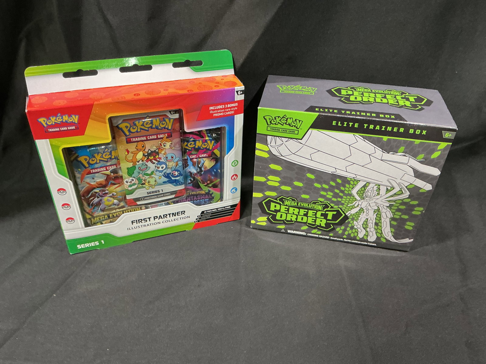 First Partner & Perfect Order ETB: A pairing that has consistently attracted bidder interest, this lot combines a factory sealed First Partner Illustration Collection Series 1 box with a Mega Evolution Perfect Order Elite Trainer Box.