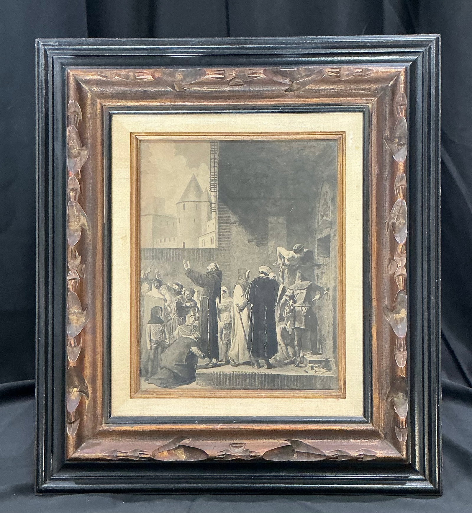 Laurens Carcassonne Framed Print: Framed print after Jean-Paul Laurens depicting the historic scene 'La Délivrance des Emmurés de Carcassonne' (Freeing of the Imprisoned in Carcassonne). Presented in a decorative carved frame with