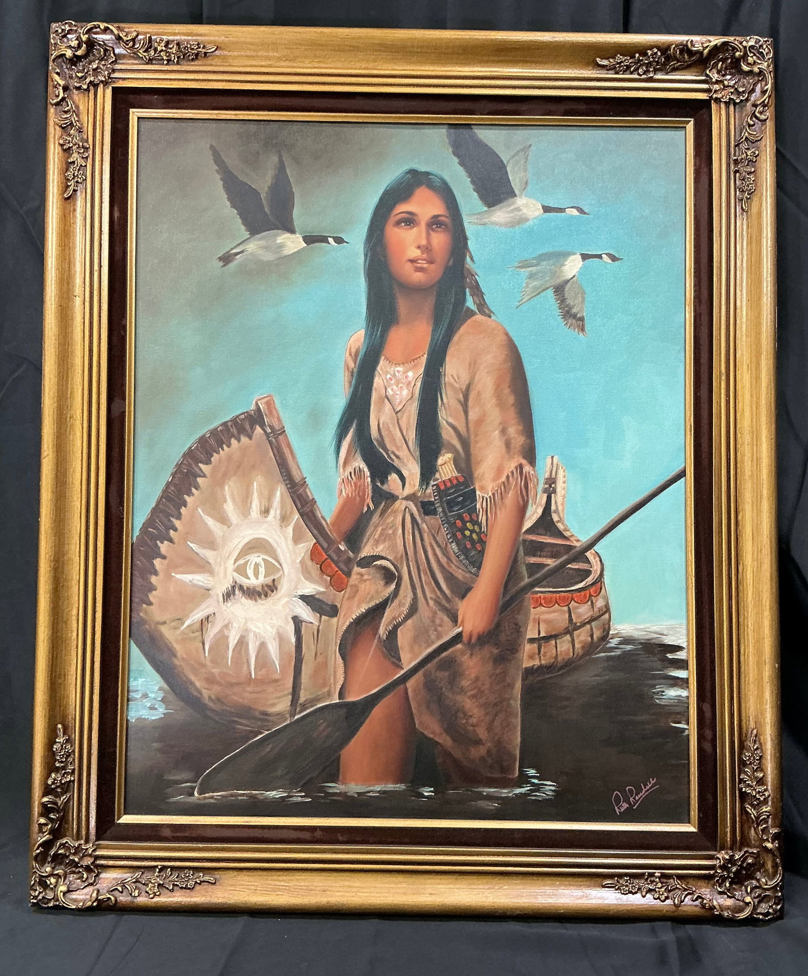 Paul Searle Native Maiden Oil: Original framed oil painting by Paul Searle depicting a Native American maiden standing beside a canoe with Canada geese in flight. Signed lower right and identified on the reverse. Decorative wildlif
