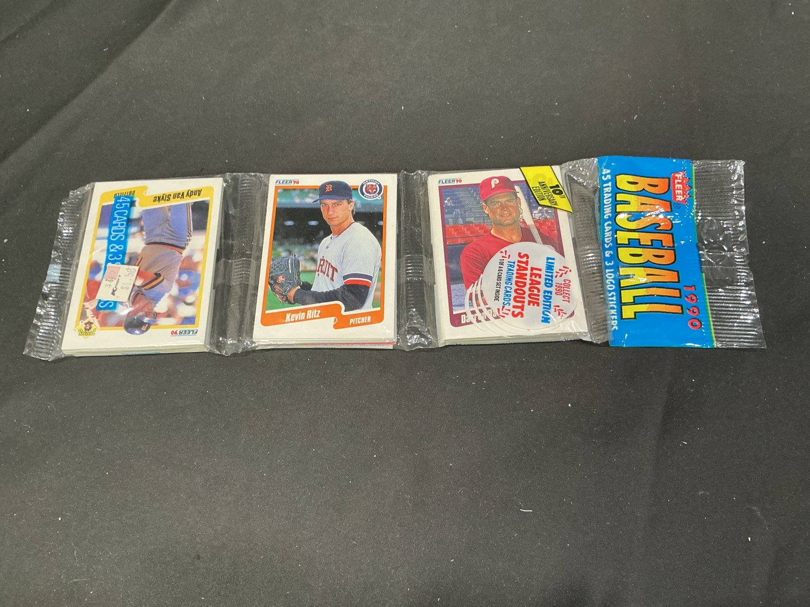1990 Fleer Baseball Value Pack: Back again, sealed 1990 Fleer Baseball Value Pack containing 45 trading cards and 3 logo stickers in the original factory wrapper. A nostalgic unopened vintage pack with the chance to uncover stars, r