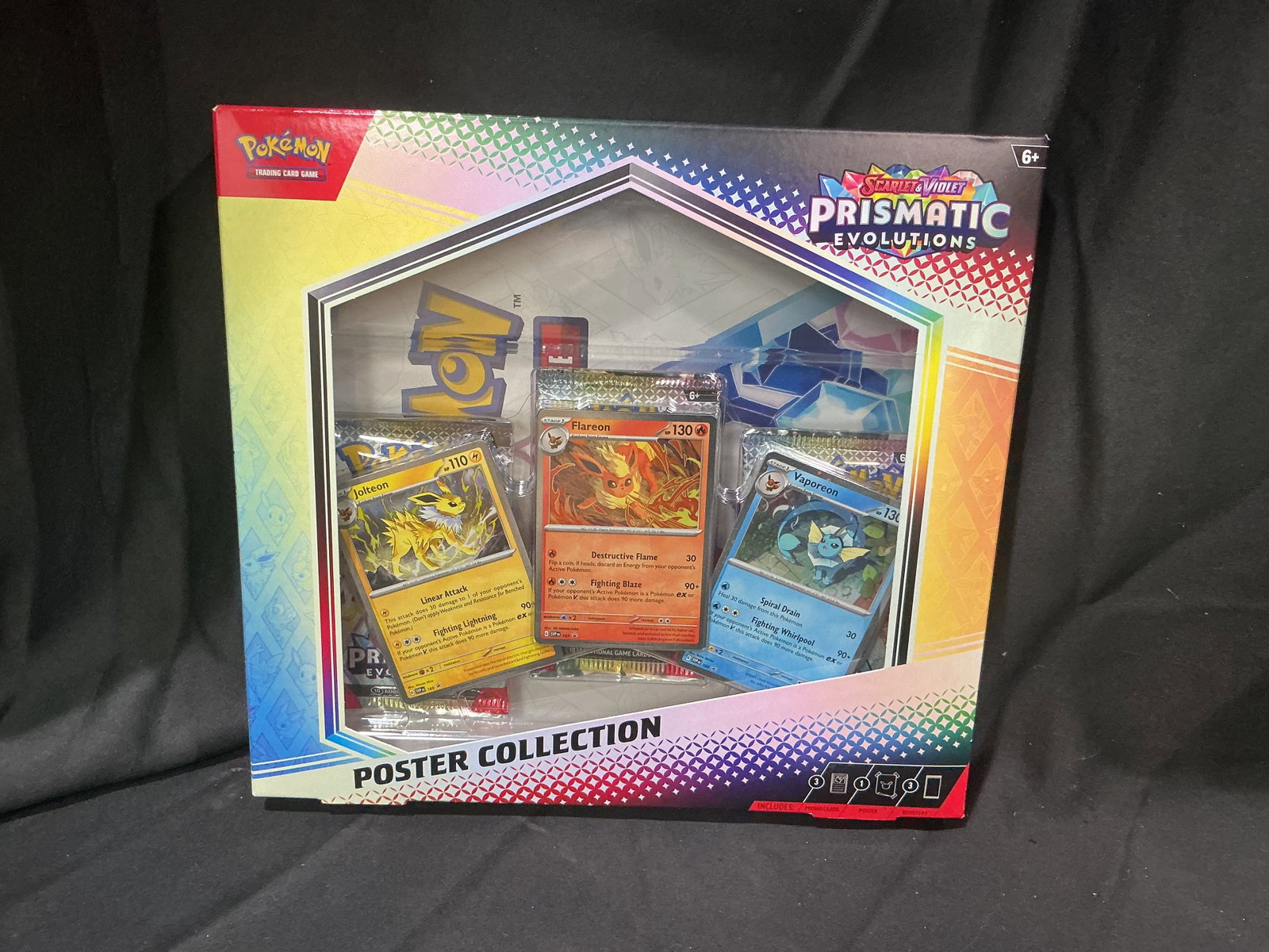 Prismatic Eevee Poster Box: Another opportunity to pick up this factory sealed Pokemon Scarlet & Violet Prismatic Evolutions Poster Collection featuring Eevee, Flareon, Jolteon, and Vaporeon promo cards, booster packs, and an