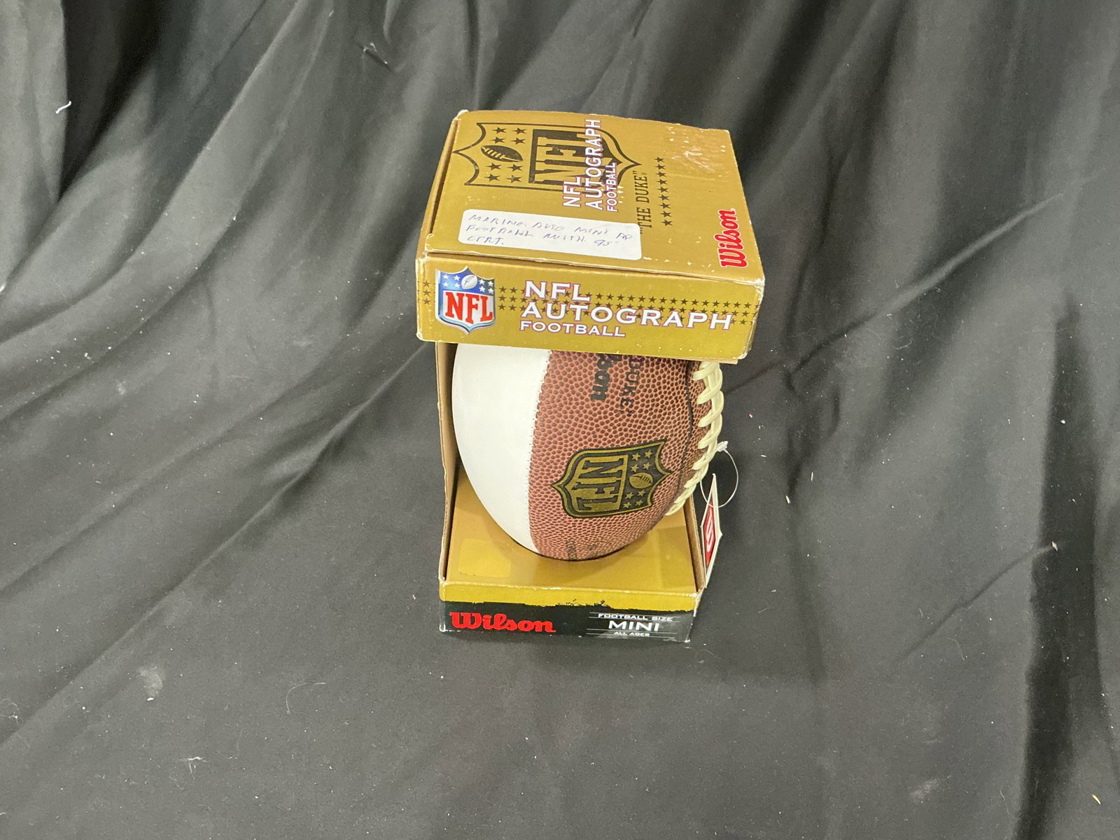 Dan Marino signed NFL Wilson Mini Football: Back again, Wilson NFL mini football signed by star quarterback Dan Marino in his 17-year NFL career for the Miami Dolphins. Presented in its original Wilson NFL autograph display box with