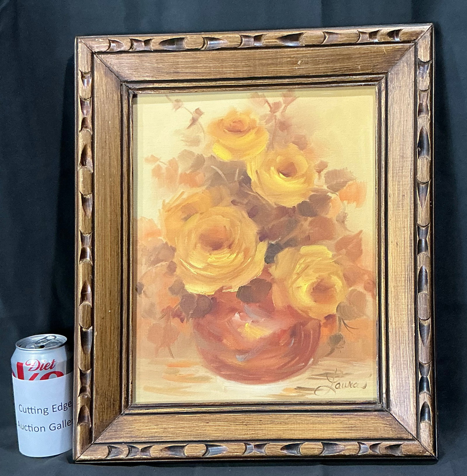 Laura Framed Floral Still Life: Framed floral still life painting signed 'Laura' featuring a warm arrangement of yellow and orange blossoms in a decorative vase. Soft, traditional styling and an ornate wood frame make this an