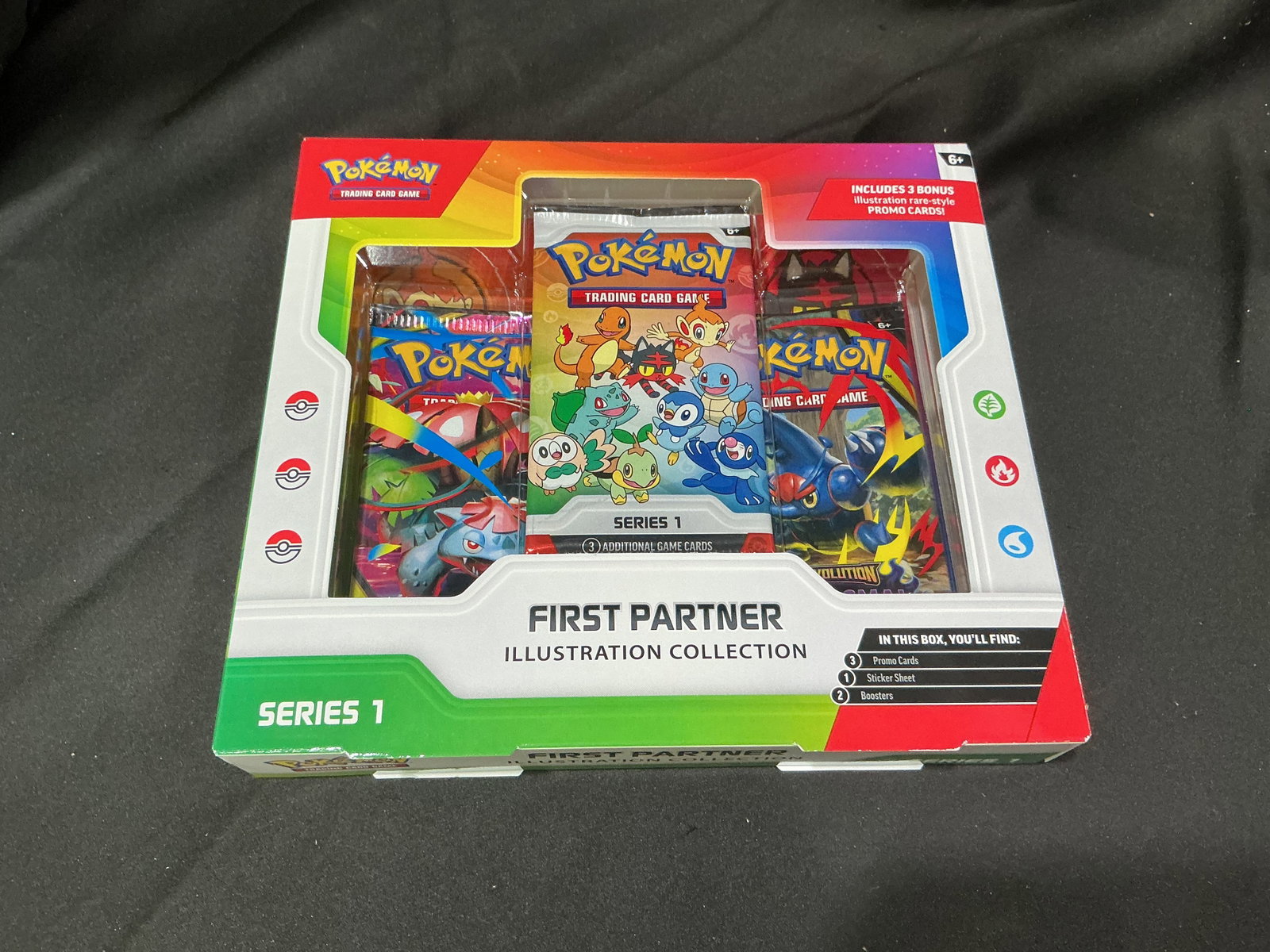 Pokemon First Partner Collection S1: Pokemon First Partner Illustration Collection Series 1 featuring three Series 1 booster packs, three oversized illustration promo cards, and a themed sticker sheet celebrating the original first