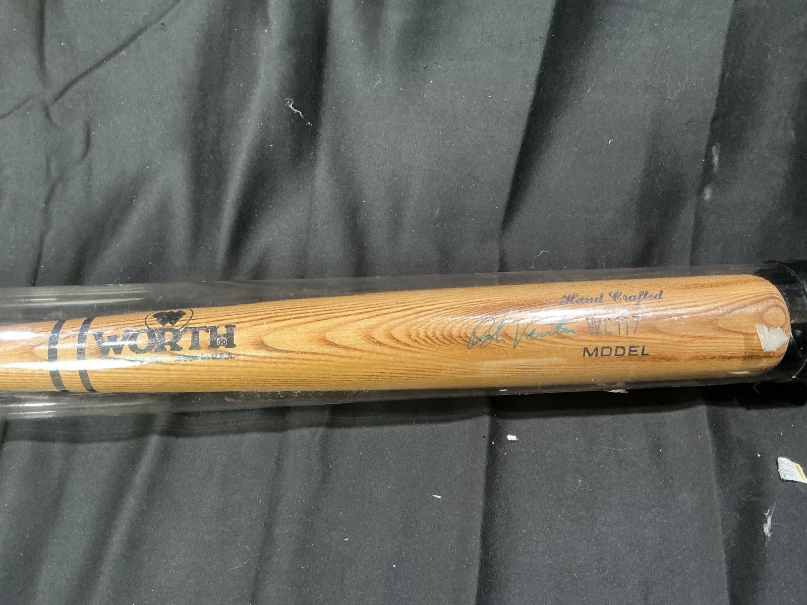 Worth WC17 Bob Ventura Signed Bat: Worth WC17 hand-crafted wood baseball bat featuring Bob Ventura's signature on the barrel. Retaining its original clear display tube with end caps, this attractive natural wood bat makes a fine