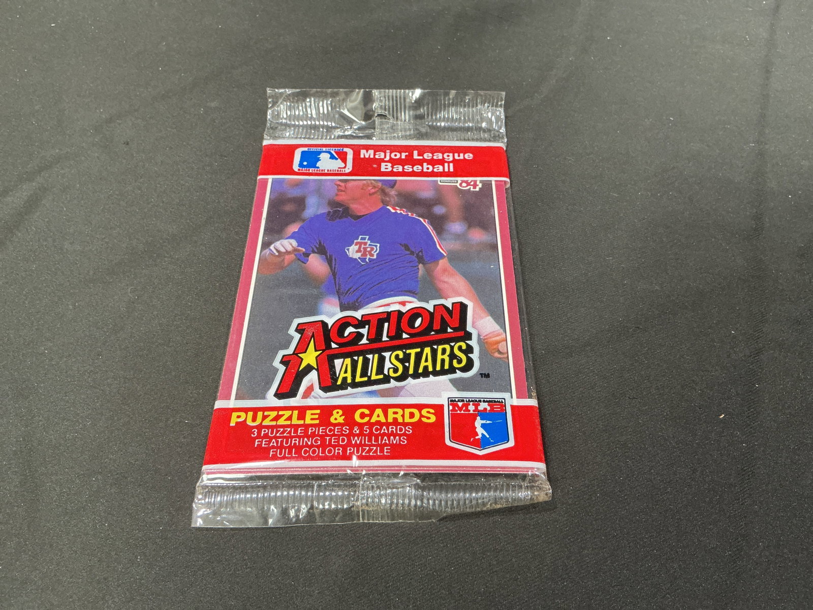 1984 Action All-Stars Baseball Pack: Factory sealed 1994 Action All-Stars Major League Baseball pack featuring five oversized cards and three Ted Williams puzzle pieces. Produced by Donruss, this nostalgic unopened release offers