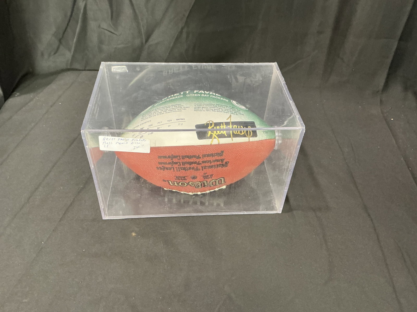 Brett Favre Signed NFL Football & Case: Back again, this Wilson official-size NFL composite football is personally signed by Brett Favre in gold marker and is presented with an included display case. The signature has not been