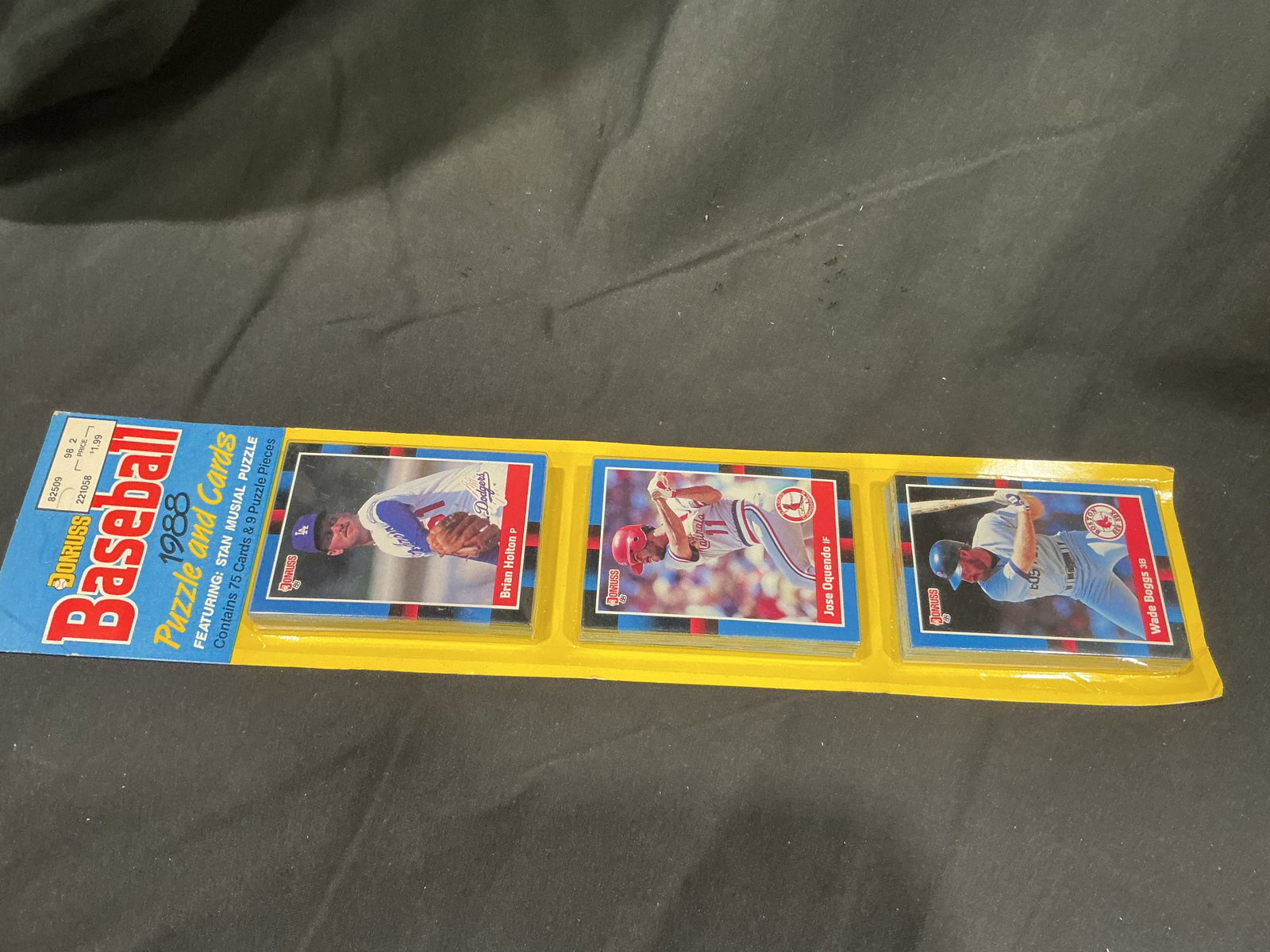 1988 Donruss Puzzle & Cards Pack: First time offered in any of our auctions, this factory sealed 1988 Donruss Baseball Puzzle & Cards pack features Kevin Seitzer, Bobby Bonilla, and Bob Sebra on the visible card fronts. Includes 75