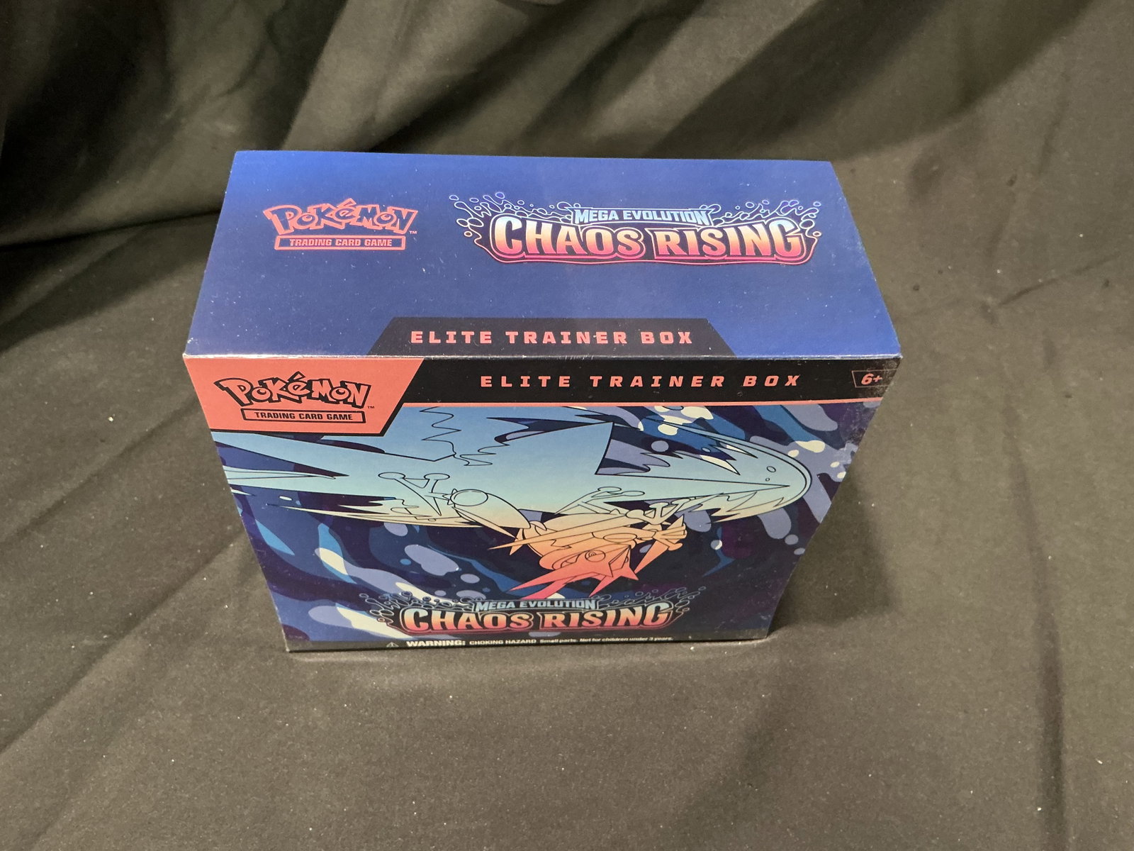 Chaos Rising Pokemon ETB Sealed: Back in the lineup, this factory sealed Pokemon Mega Evolution Chaos Rising Elite Trainer Box features Greninja artwork and Mega Evolution series branding. Packed with booster packs and collector