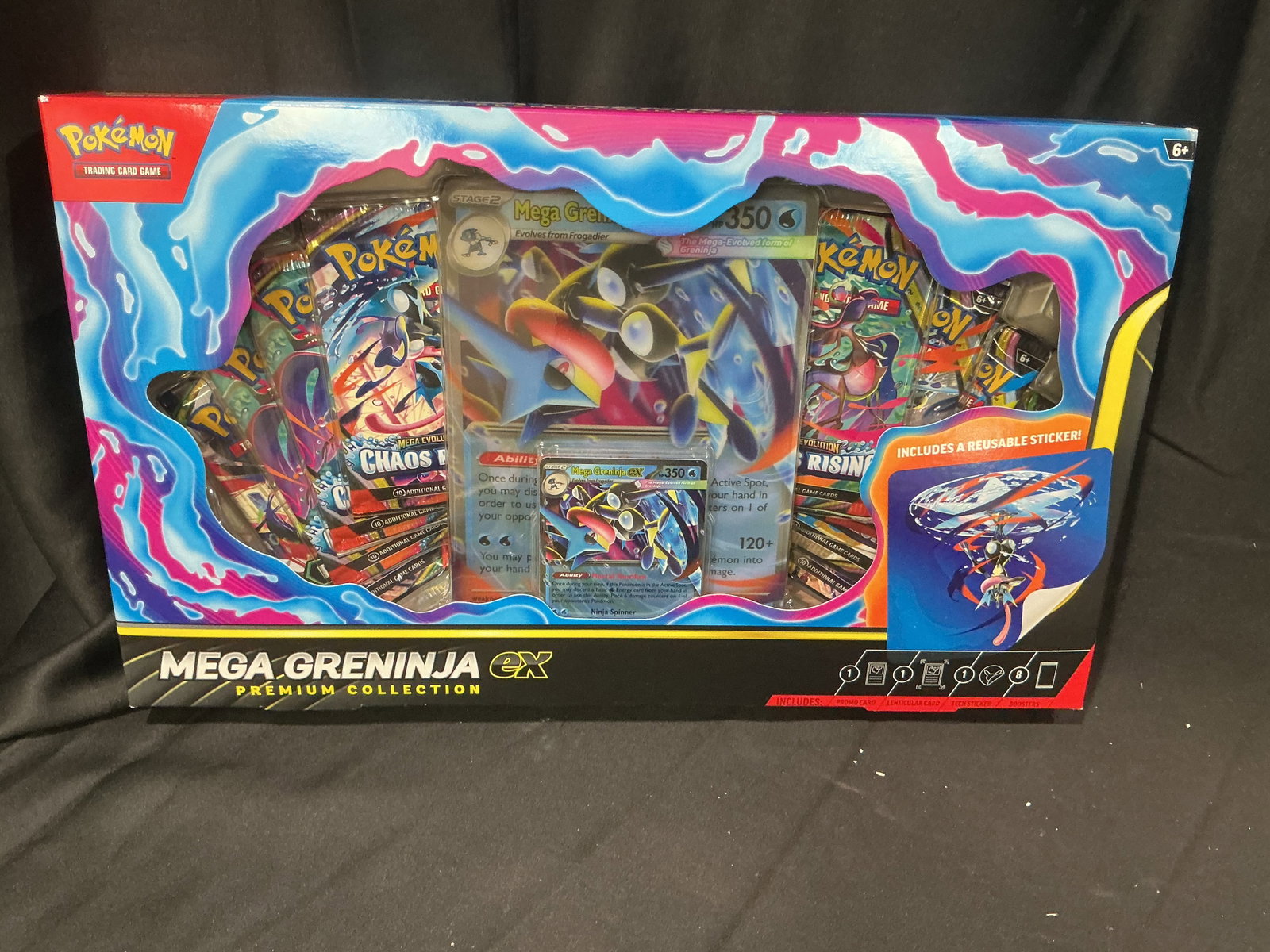 Mega Greninja ex Premium Collection: Returning after a previous appearance, this factory sealed Pokemon Mega Evolution Mega Greninja ex Premium Collection features a Mega Greninja ex foil promo card, an oversized lenticular display card,