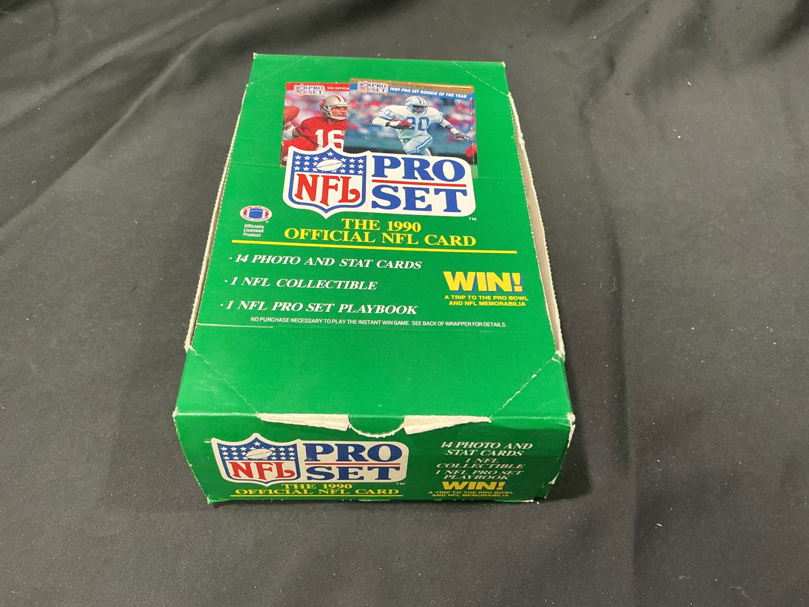 1990 NFL Pro Set Retail Display Box: Returns after prior appearance, this original 1990 NFL Pro Set retail display box features colorful period graphics promoting the inaugural Pro Set NFL trading card release. Designed for hobby shop