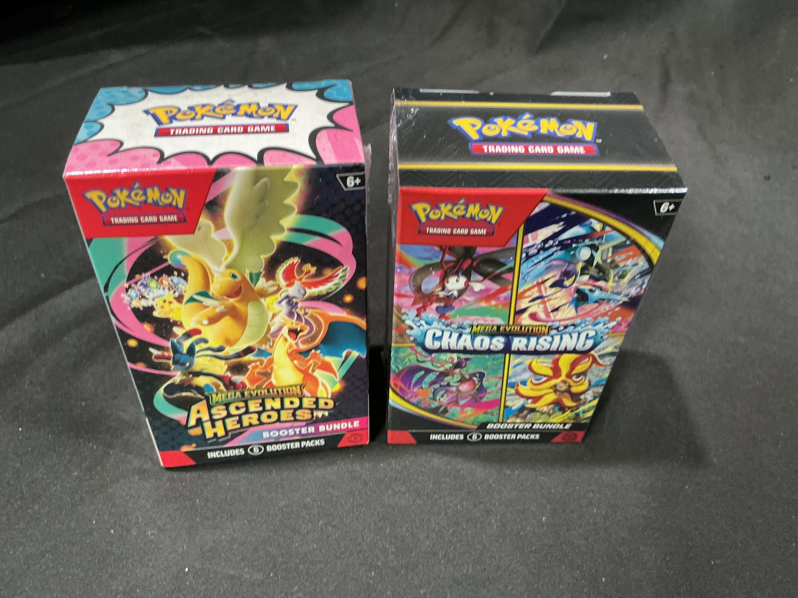 Ascended Heroes & Chaos Rising Bundles: Bringing together two popular Mega Evolution releases once more, this factory sealed pairing includes an Ascended Heroes Booster Bundle and a Chaos Rising Booster Bundle. The combination offers a conv