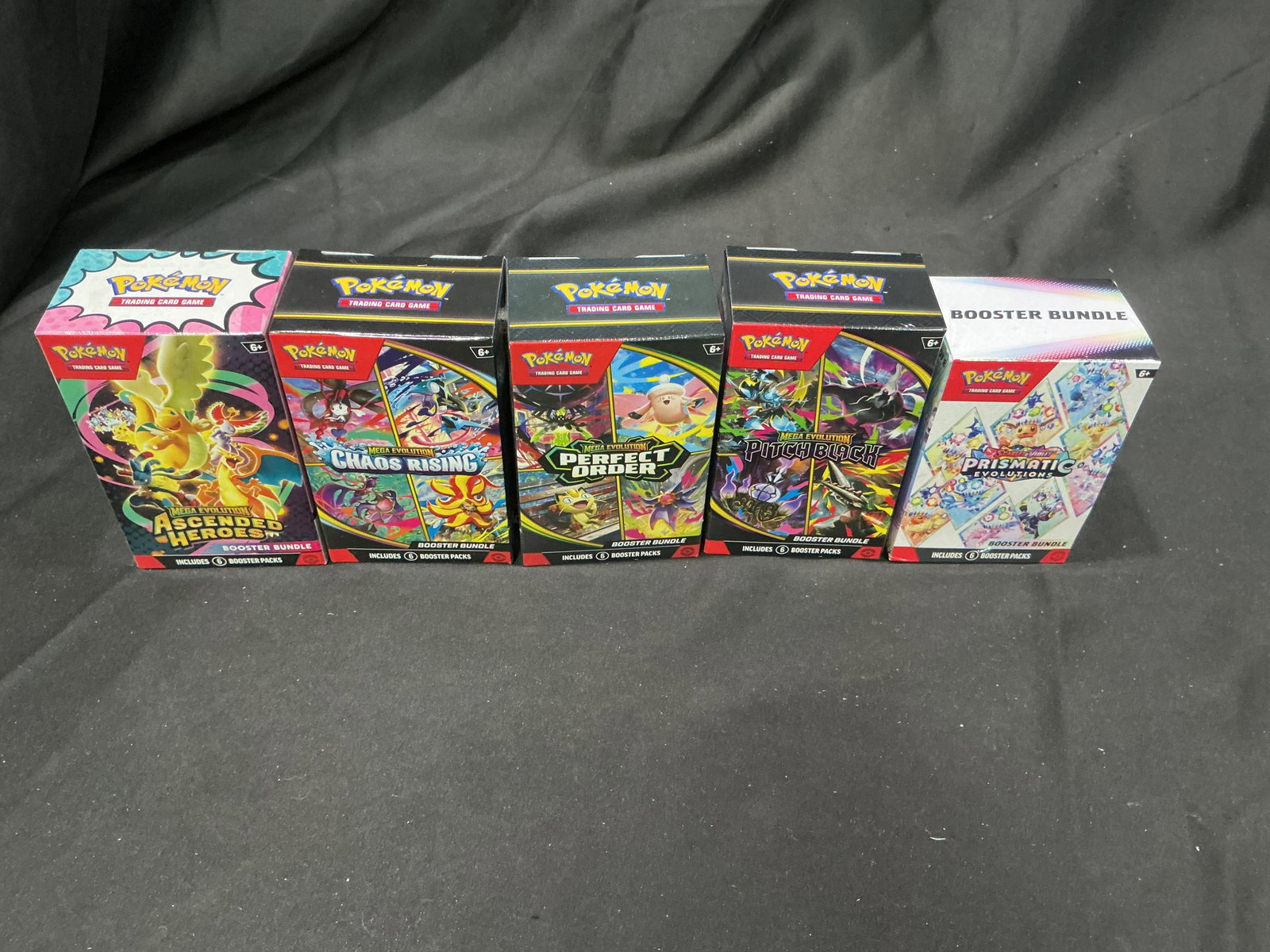 Mega Evolution 5 Booster Bundle Set: Featured once more, this factory sealed Pokemon Mega Evolution assortment brings together Booster Bundles from Ascended Heroes, Chaos Rising, Perfect Order, Pitch Black, and Prismatic Evolutions.