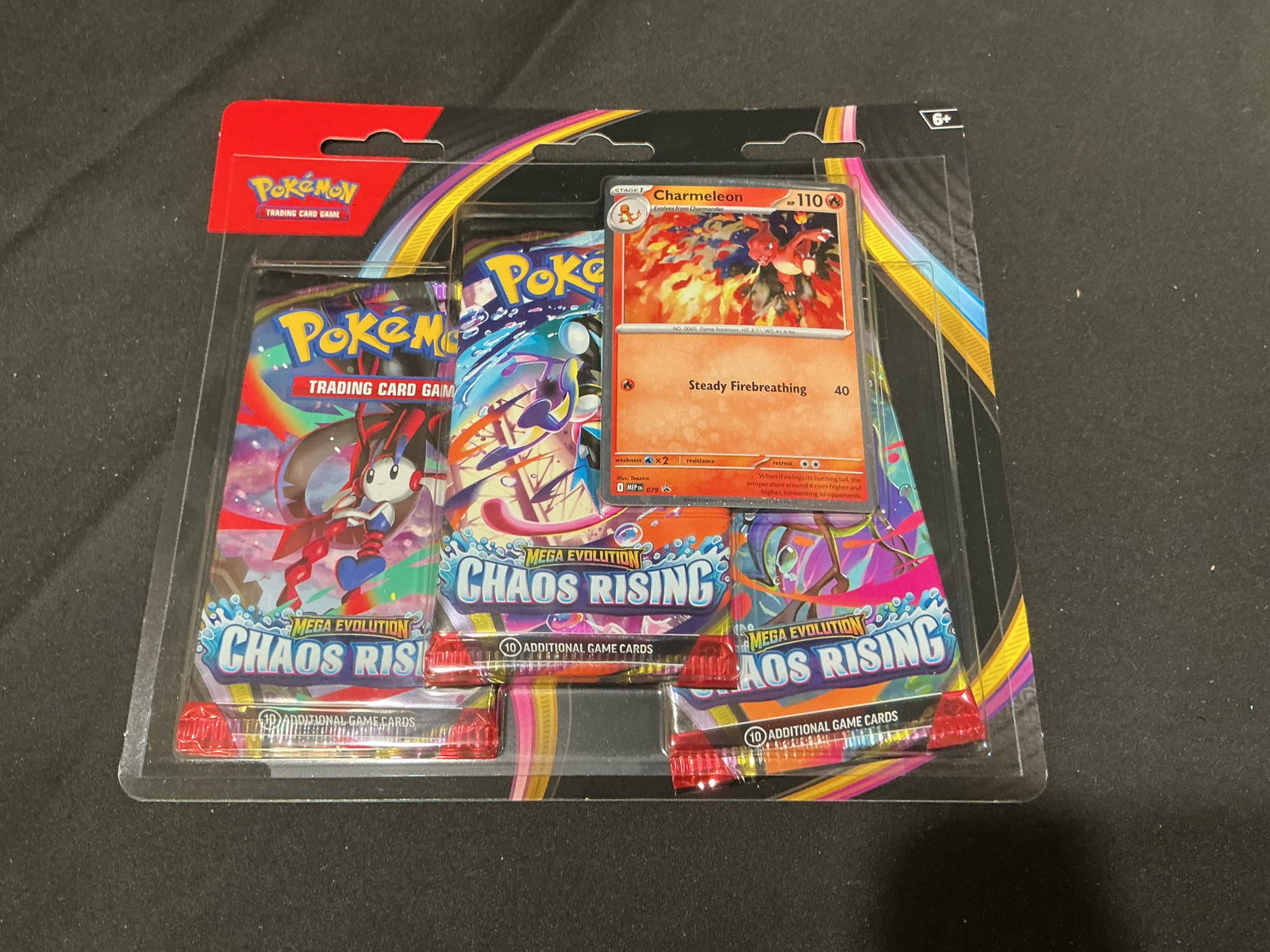 Chaos Rising Charmeleon 3-Pack Blister: Returning after prior appearances, this factory sealed Pokemon Mega Evolution Chaos Rising three-pack blister includes three Chaos Rising booster packs and an exclusive Charmeleon foil promo card.