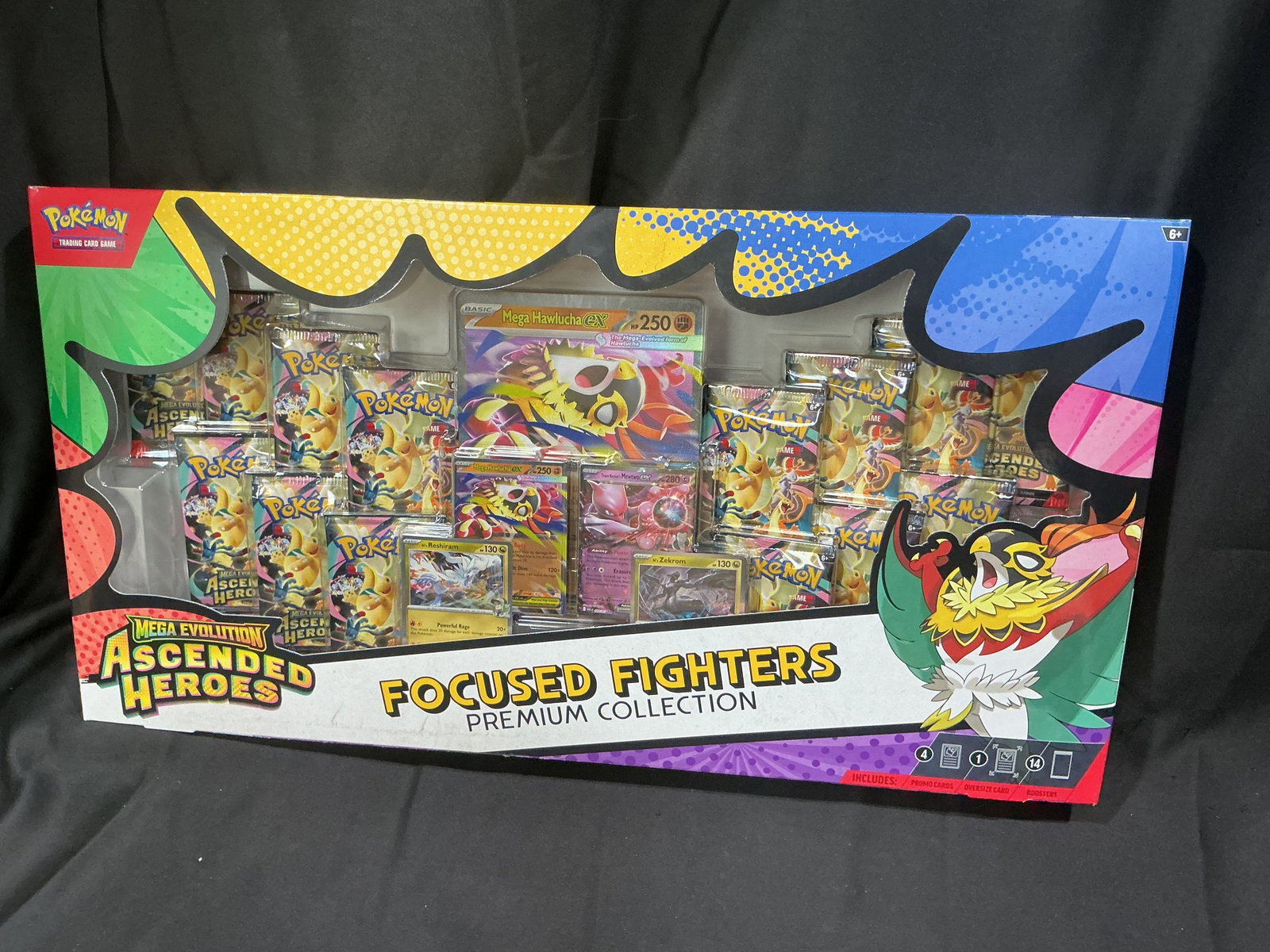 Focused Fighters Premium Box: Offered once more, this factory sealed Pokemon Mega Evolution Ascended Heroes Focused Fighters Premium Collection features Mega Hawlucha ex with an oversized display card, four promo cards, and 14