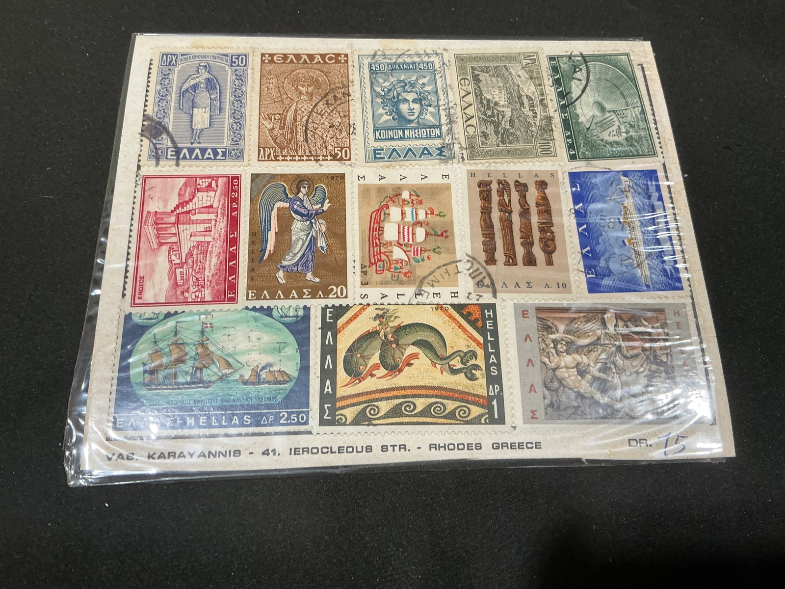 Vintage Greece Commemorative Stamp Display Card: A colorful vintage philatelic offering, this Greece commemorative stamp display card features an assortment of cancelled Greek postage stamps mounted on an original dealer presentation card. Includes