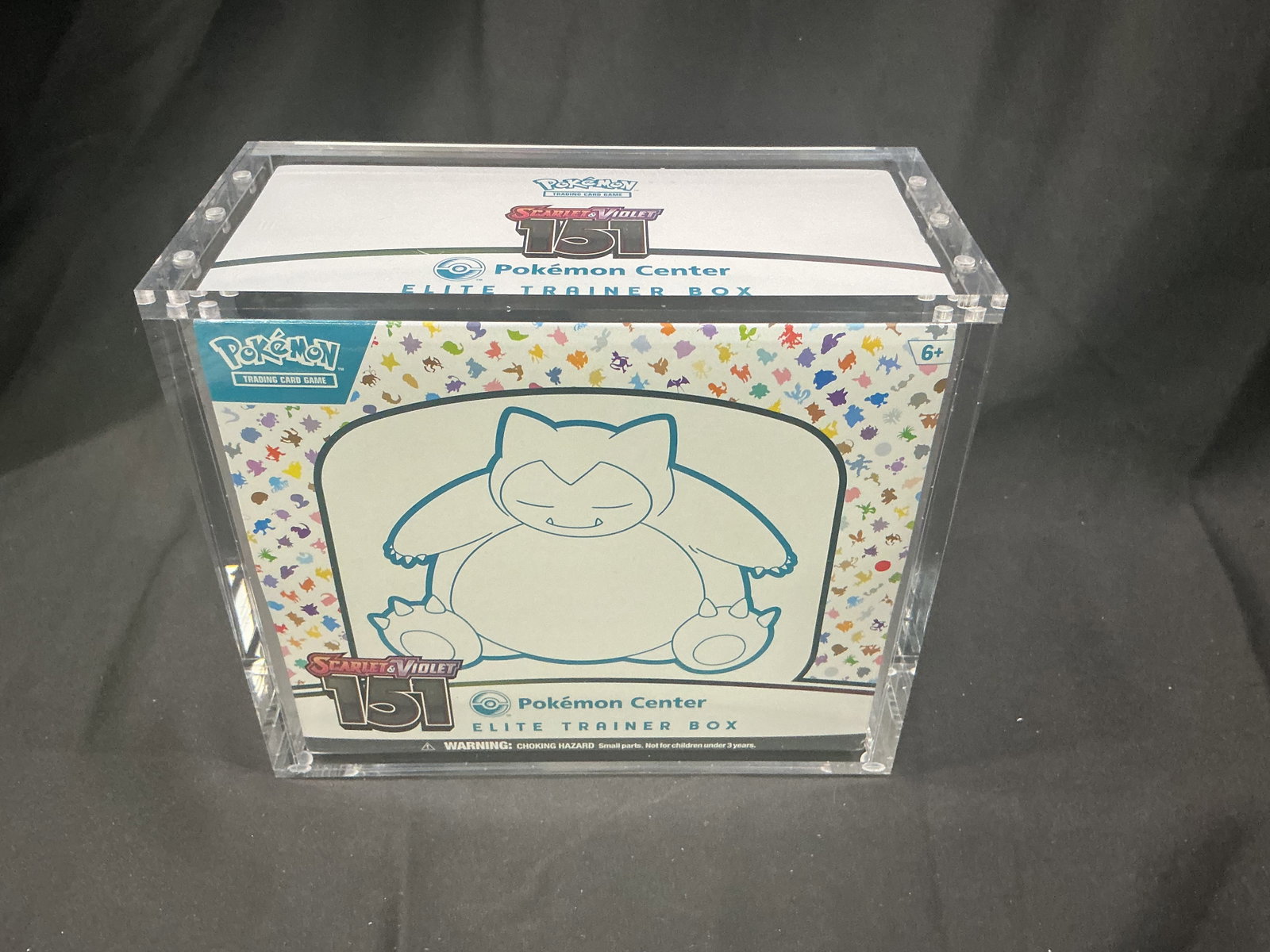 SV 151 Pokemon Center ETB Acrylic: Offered for its second appearance in our auctions, this factory sealed Pokemon Center Scarlet & Violet 151 Elite Trainer Box comes with the acrylic display case shown included in the sale. Our only