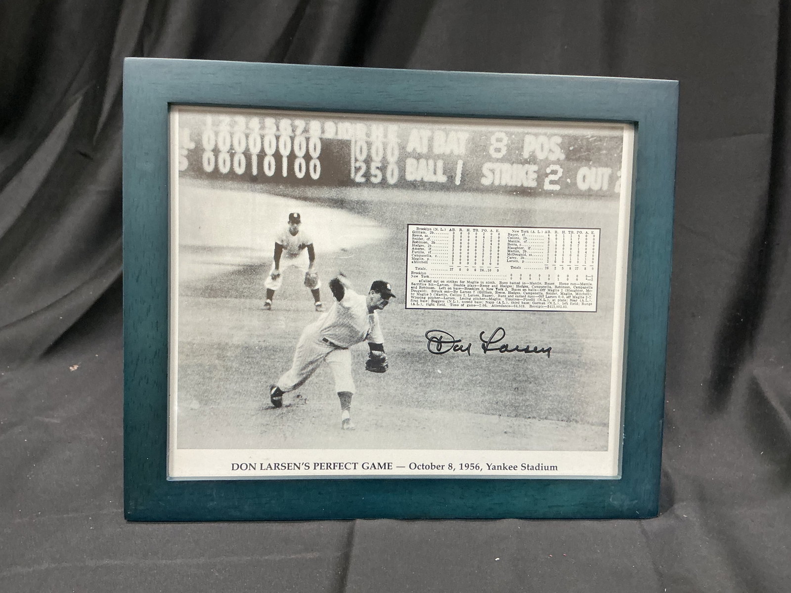 Don Larsen Perfect Game Yankees Framed Display: Presented again for baseball history collectors, this framed display commemorates Don Larsen's historic perfect game in the 1956 World Series at Yankee Stadium. It features a black-and-white action im