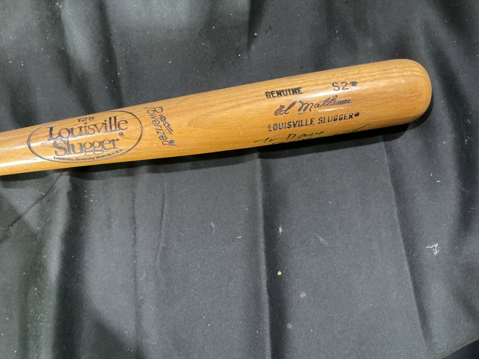 Eddie Mathews Autographed Louisville Slugger Bat: Offered again, this Louisville Slugger model S2 baseball bat is signed in green marker by Hall of Famer Eddie Mathews with the inscription 'To Dave, Best Wishes, Eddie Mathews.' The vintage game-model