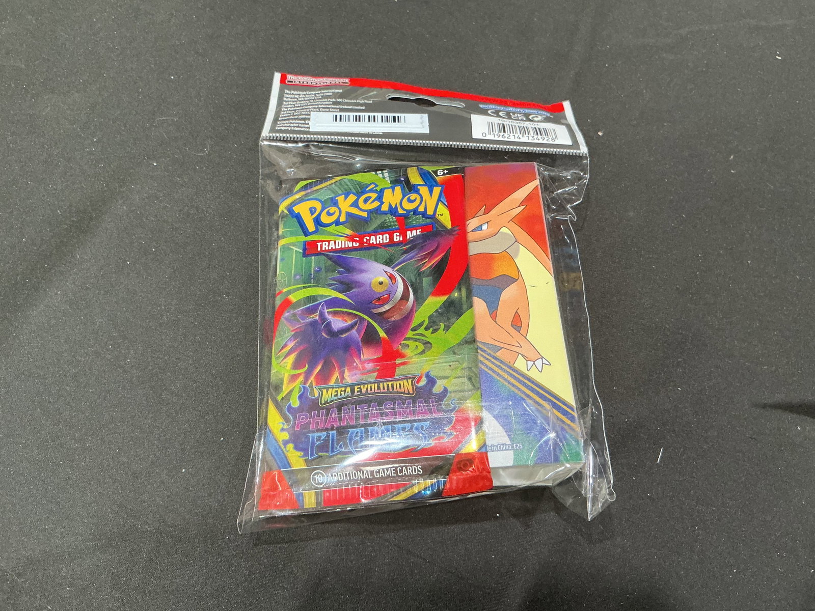 Mega Gengar Phantasmal Flames Mini Portfolio: First time offered in this auction, this factory sealed Pokemon Mega Evolution Phantasmal Flames Mini Portfolio includes a themed mini card portfolio paired with a matching Phantasmal Flames booster