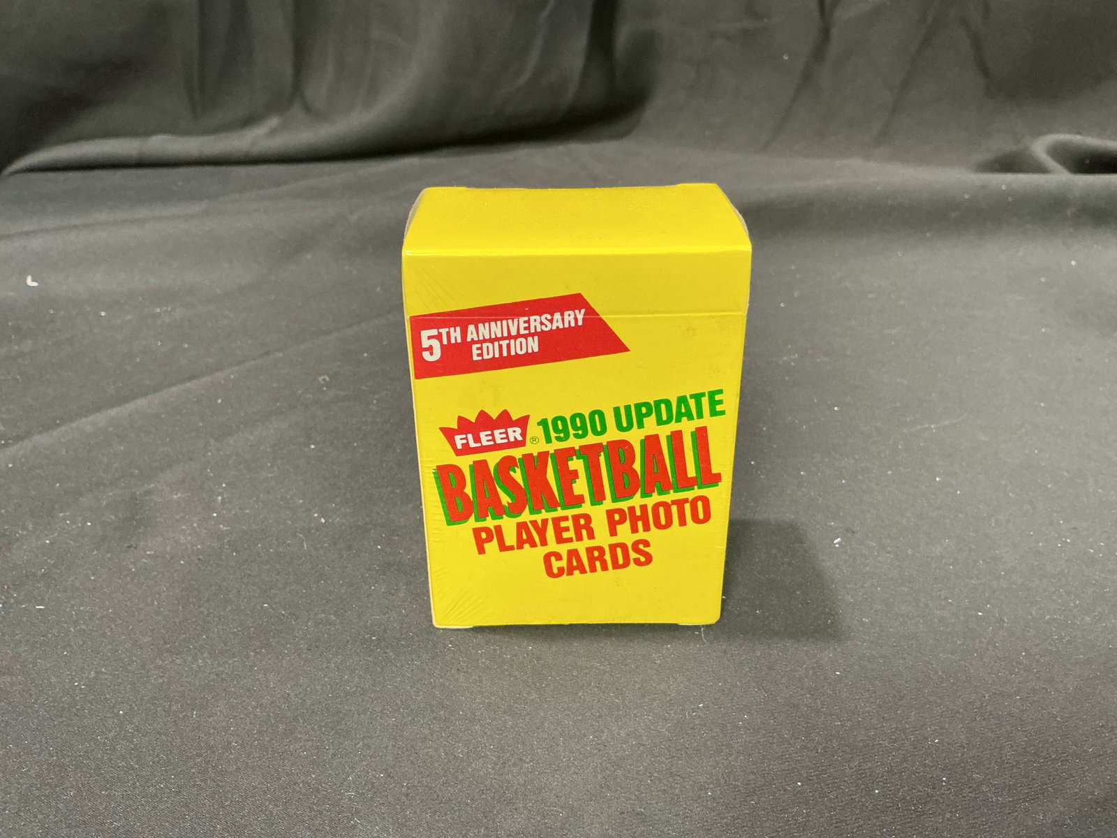 1990 Fleer Update Basketball 100-Card Sealed Box: Offered once more, this factory sealed Fleer 1990 Update Basketball Player Photo Cards 5th Anniversary Edition box contains 100 cards. The vintage NBA update release offers nostalgic appeal for