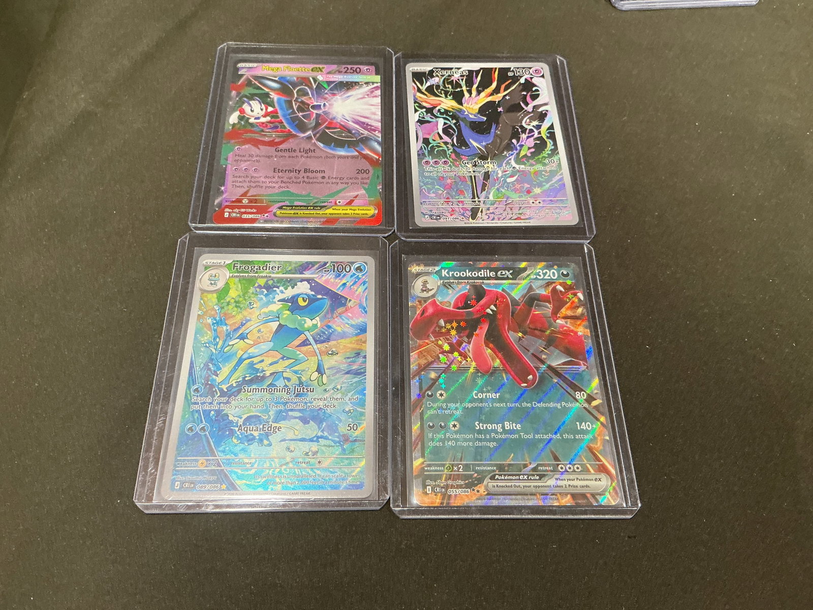 Pokemon Perfect Order Holo & ex Card Lot: Four-card Pokemon Mega Evolution Perfect Order lot featuring Mega Floette ex #075/086, Xerneas #071/086, Frogadier #069/086, and Krookodile ex #055/086. A colorful group combining Mega Evolution, ex,