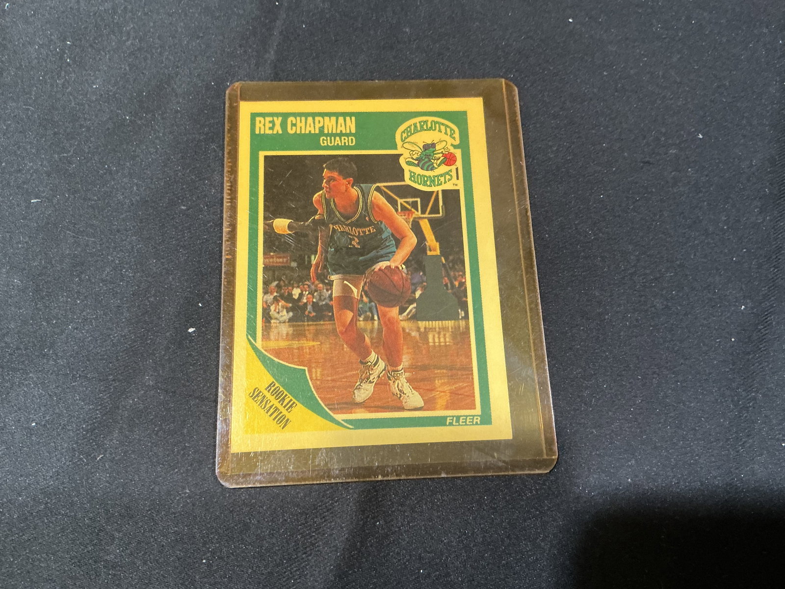 1989-90 Fleer Rex Chapman #15 Rookie Card: First appearance in this auction, a 1989-90 Fleer Rex Chapman #15 Rookie Sensation rookie card featuring Chapman with the Charlotte Hornets. The card highlights his 1988-89 rookie season and offers an