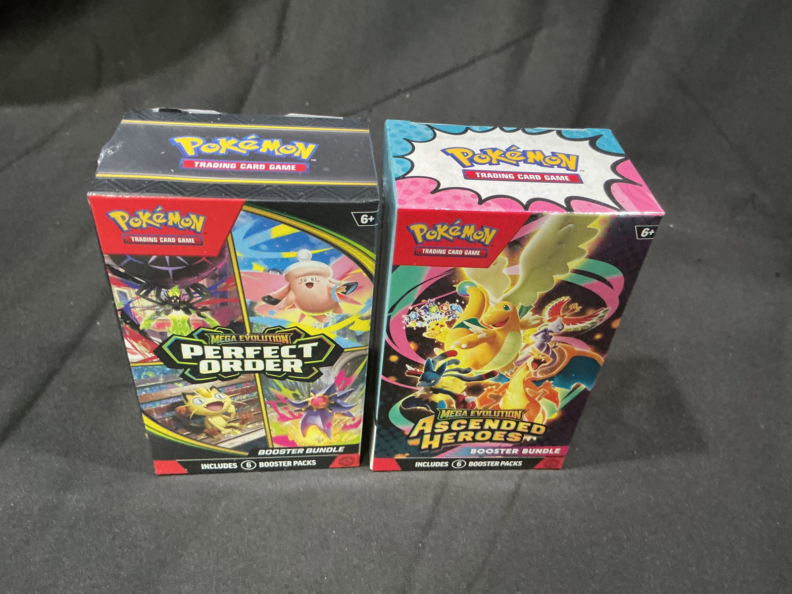 Perfect Order & Ascended Bundle Pair: Making another appearance after previous success, this factory sealed pairing combines one Pokemon Mega Evolution Perfect Order Booster Bundle with one Ascended Heroes Booster Bundle. Offering packs