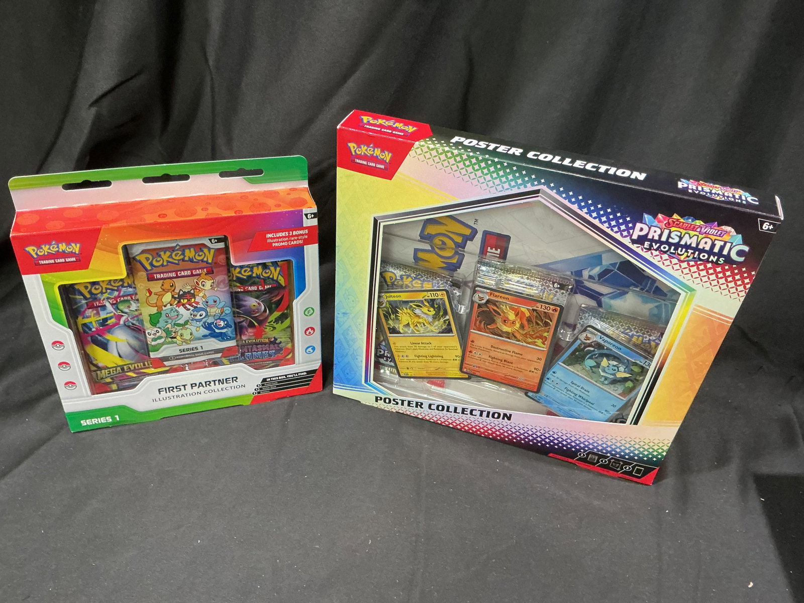 Pokemon First Partner Series 1 & Eevee Poster Set: Offered again as a mixed sealed Pokemon pairing, this lot features a First Partner Illustration Collection Series 1 along with an Eevee poster collection. The Series 1 box contains three illustration 