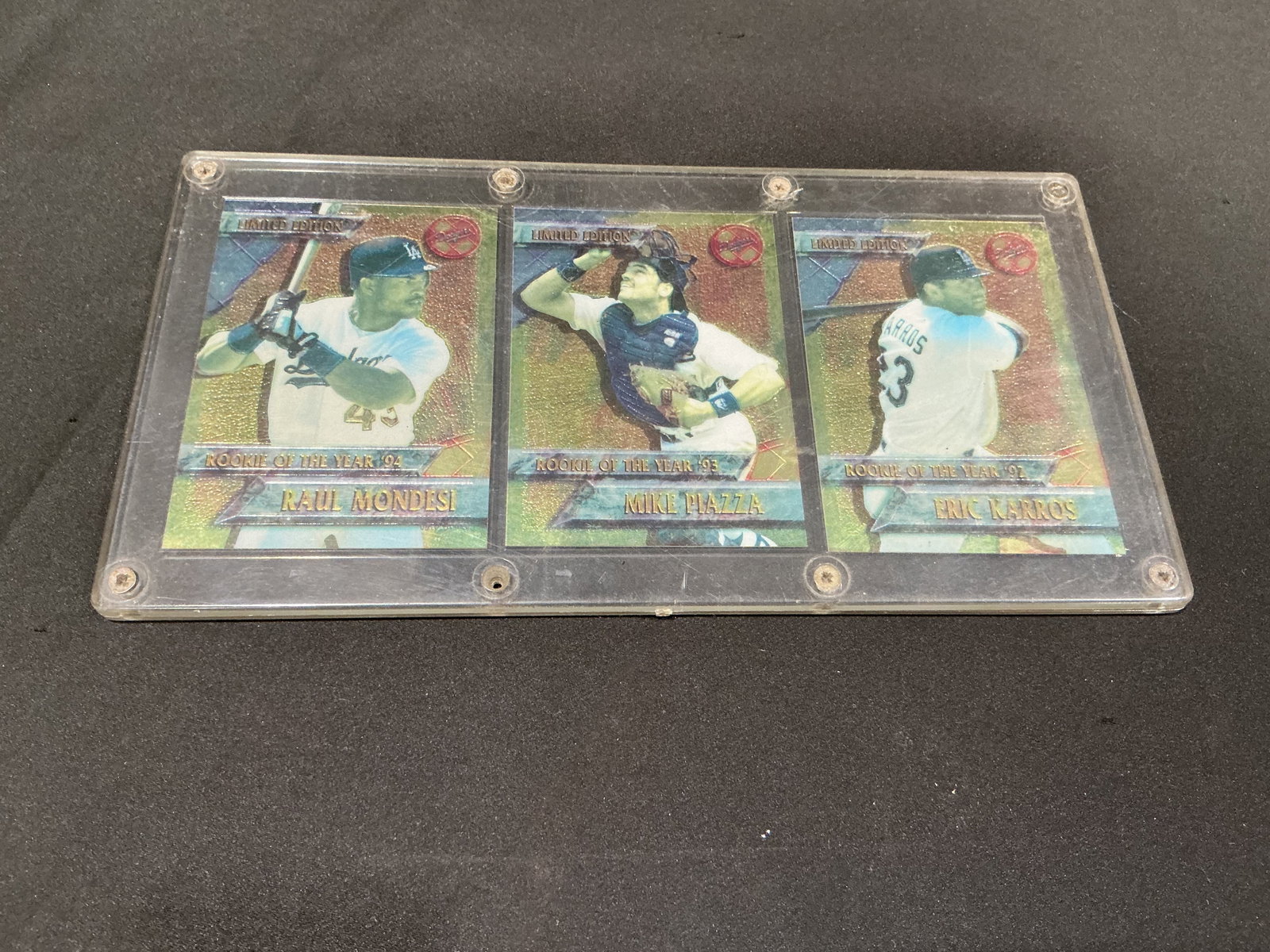 Dodgers Rookie of the Year Limited Edition 3-Card Set: Limited Edition Los Angeles Dodgers three-card display featuring Rookie of the Year honorees Raul Mondesi, Mike Piazza, and Eric Karros. The metallic-finish cards commemorate Mondesi as 1994 Rookie of