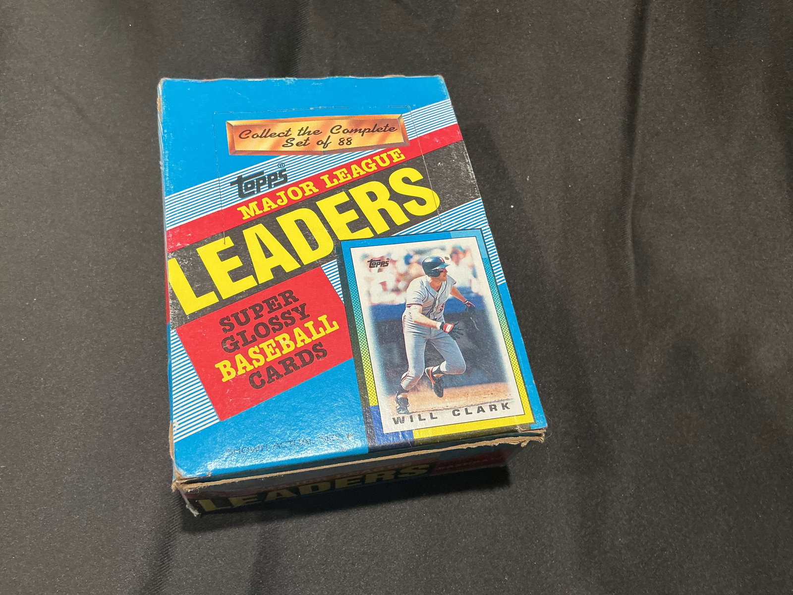 Topps Major League Leaders Super Glossy Baseball Card Box: Vintage Topps Major League Leaders Super Glossy Baseball Cards box featuring the 1980s-style Leaders release and Will Clark artwork on the front. The packaging advertises a complete 88-card set and