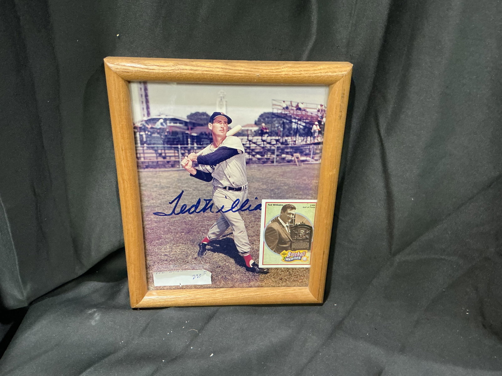 Ted Williams Signed Framed Display Baseball Heroes Card: Centered on one of baseball's most celebrated hitters, this framed display features a large-format Ted Williams image with a prominent blue-marker signature across the photo. A Ted Williams 'Baseball