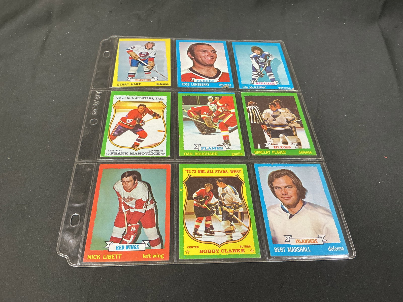1973-74 Topps Hockey Mahovlich Clarke 9-Card Group: A colorful nine-card vintage 1973-74 Topps hockey grouping making its first appearance, highlighted by Hall of Famers Frank Mahovlich and Bobby Clarke on their 1972-73 NHL All-Star cards. Also include
