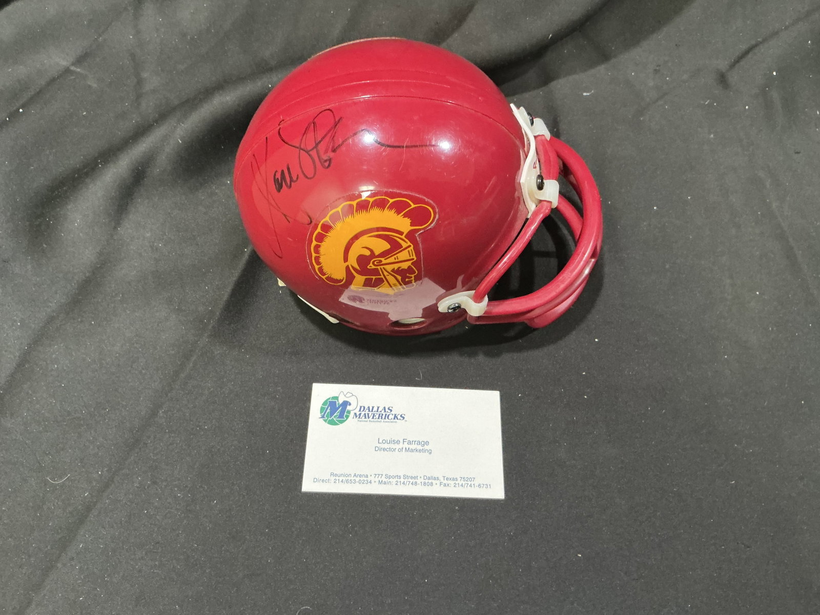 Marcus Allen Signed USC Trojans Riddell Mini Helmet: From the collection of Louise Farrage, former Director of Marketing for the Dallas Mavericks at Reunion Arena, this red USC Trojans Riddell mini football helmet bears a bold black-marker autograph