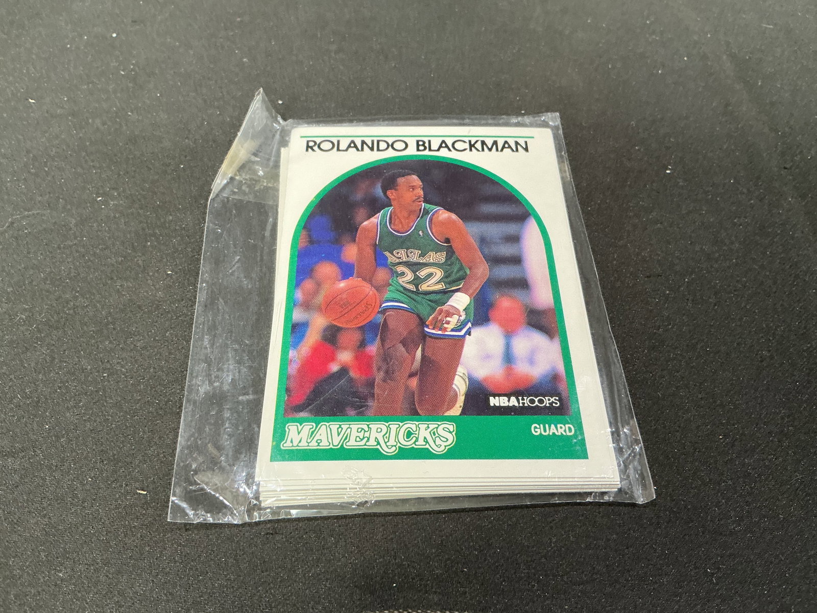 1989-90 NBA Hoops Rolando Blackman Mavericks Team Card Set: A Dallas Mavericks team grouping from the 1989-90 NBA Hoops basketball release, with Rolando Blackman visible at the front and head coach John MacLeod #171 visible at the reverse. The stack contains m