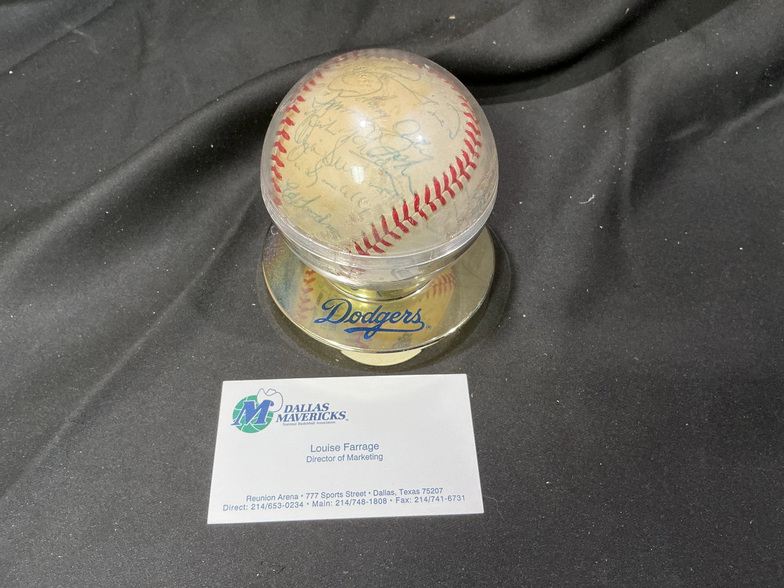 Vintage Los Angeles Dodgers Multi-Signed Baseball: From the personal collection of Louise Farrage, former Director of Marketing for the Dallas Mavericks at Reunion Arena, this vintage baseball carries numerous blue-ink signatures across its panels and