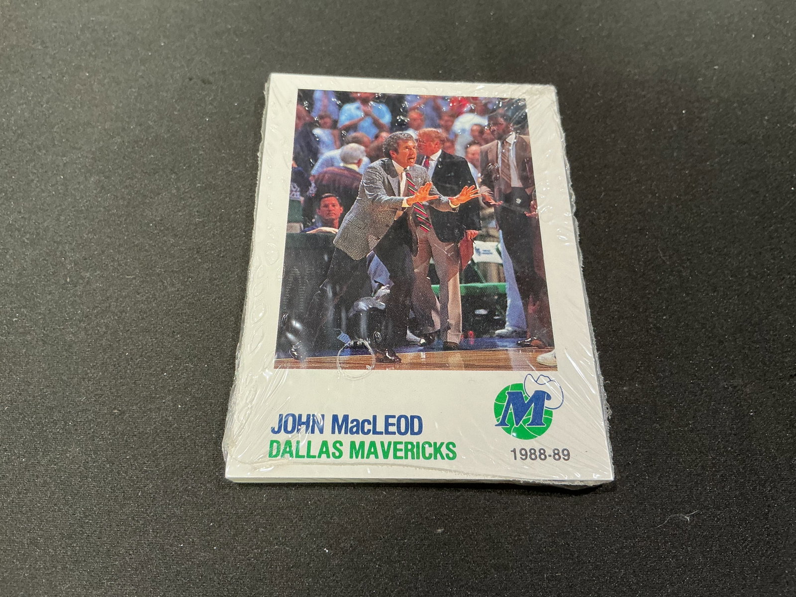 1988-89 Dallas Mavericks Bud Light Team Card Set Sealed: Making its first appearance, this sealed 1988-89 Dallas Mavericks team card set features period Mavericks photography and Bud Light sponsorship. Head coach John MacLeod is visible on the front card, w