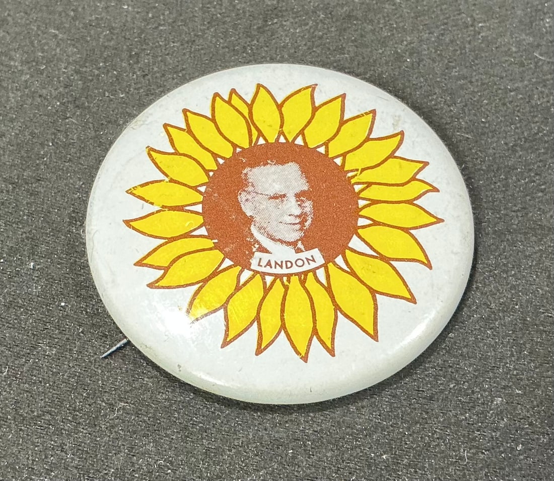 Alf Landon Sunflower Limited Edition Reproduction Pinback: Adding another colorful piece of presidential campaign imagery, this large pinback features 1936 Republican presidential nominee Alf Landon at the center of a bright yellow sunflower, a design closely
