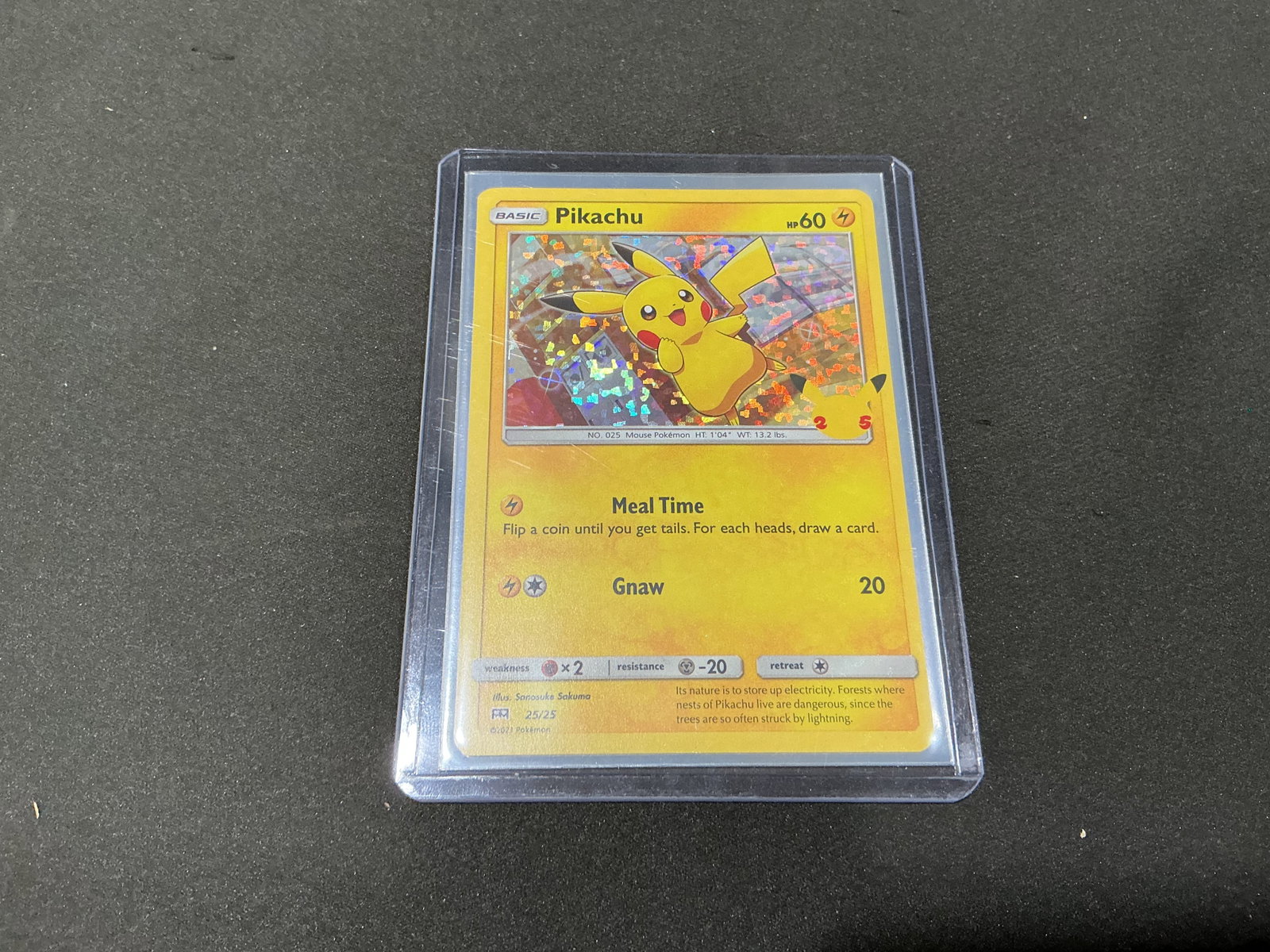 Pokemon McDonald's 25th Anniversary Pikachu Holo Card: Returning with one of the most recognizable cards from the McDonald's Pokemon 25th Anniversary release, this holographic Pikachu card features the anniversary stamp and colorful Pikachu artwork. Anoth