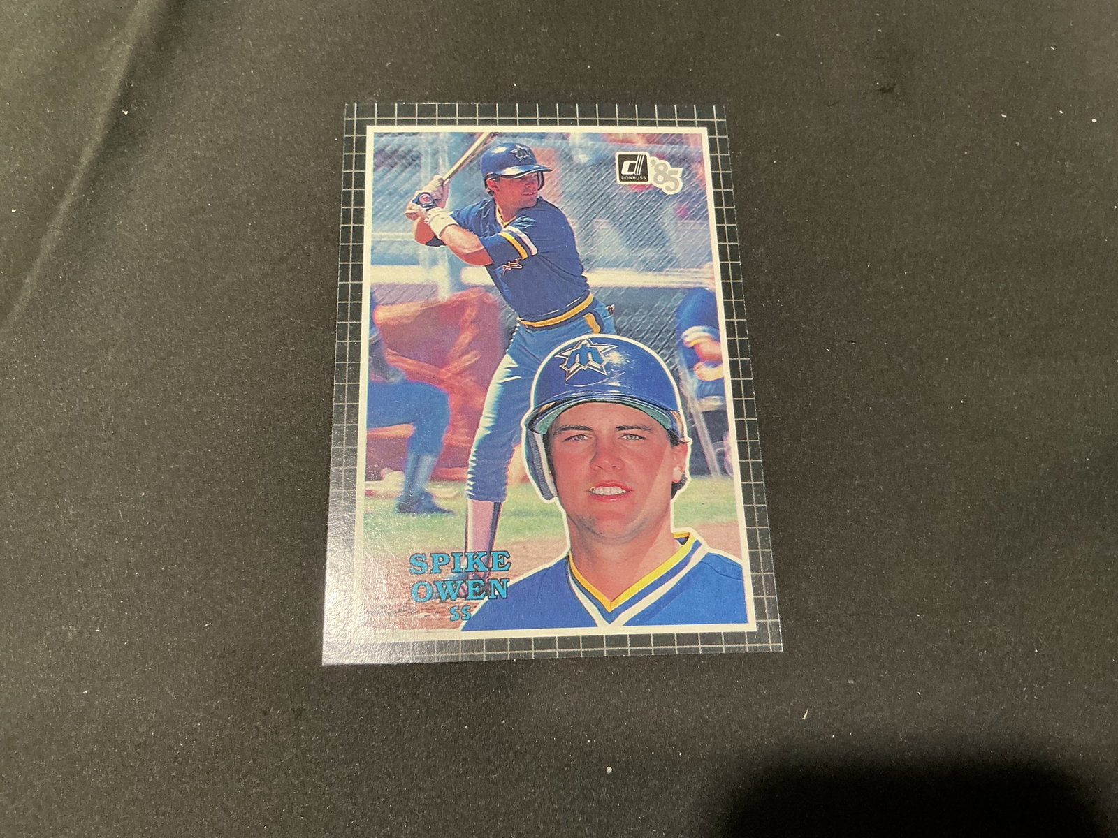 1985 Donruss Spike Owen Seattle Mariners #4: Returning to our auction, this 1985 Donruss baseball card #4 features Seattle Mariners shortstop Spike Owen. The jumbo card uses the distinctive black grid-border design of the 1985 Donruss release,