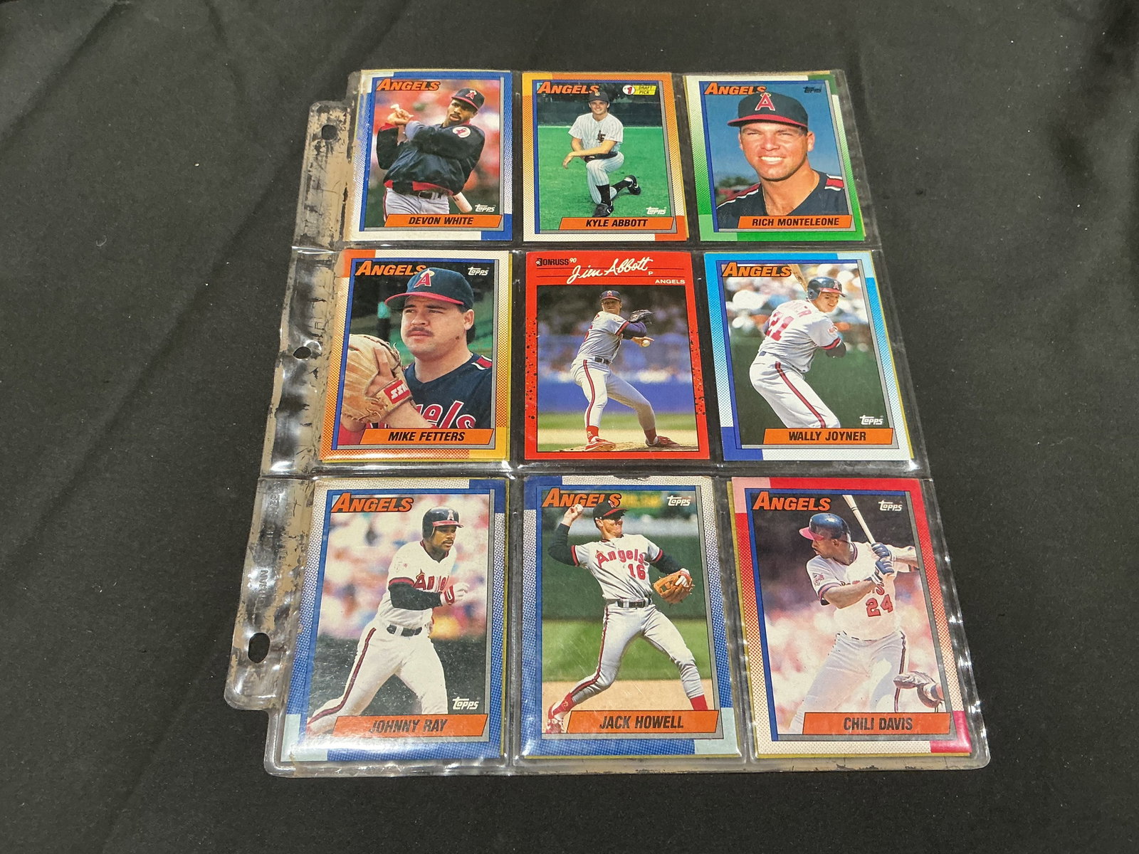 1990 Angels Baseball Card Collection Jim Abbott & Wally Joyner: Centered on the California Angels, this binder-page collection brings together a group of 1990-era baseball cards featuring Jim Abbott, Wally Joyner, Chili Davis, Devon White, Jack Howell, Lance Parri