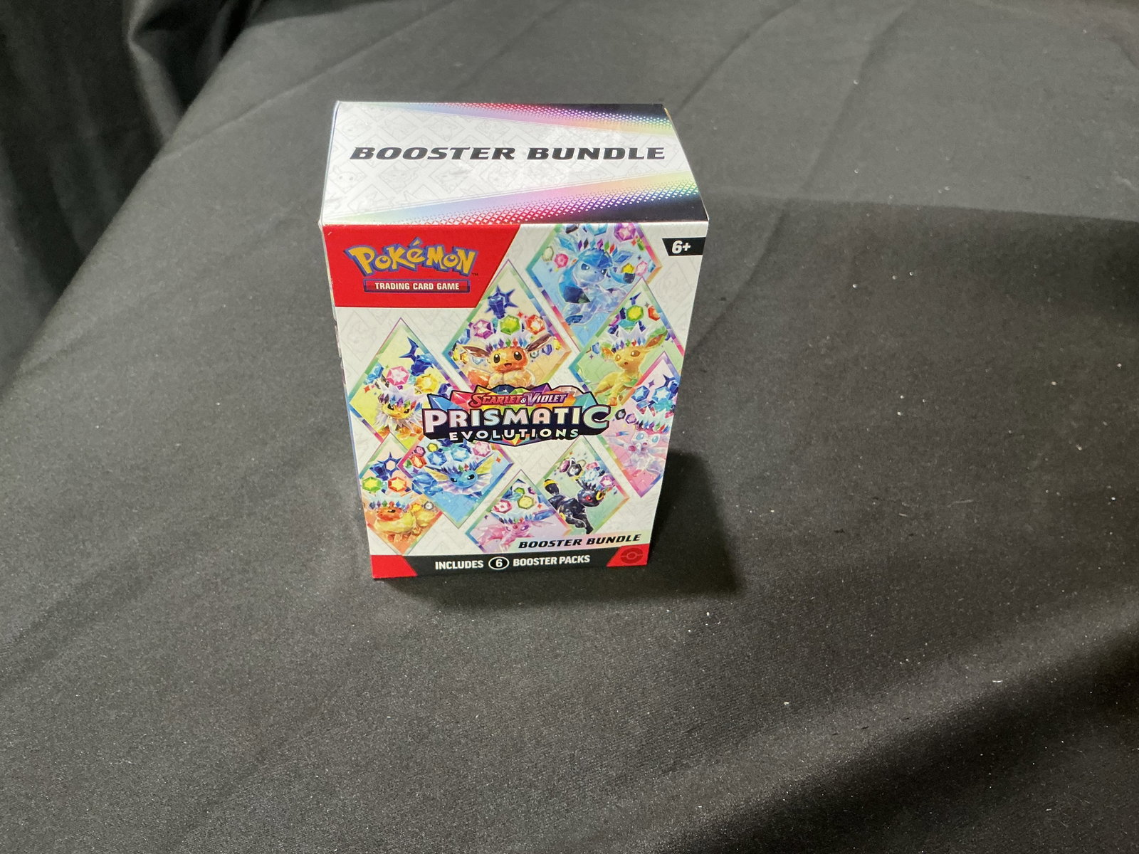 Pokemon Prismatic Evolutions Booster Bundle Sealed: Featuring Eevee and Eeveelution-themed artwork, this factory sealed Pokemon Scarlet & Violet Prismatic Evolutions Booster Bundle contains six booster packs from the popular modern release. Its compact