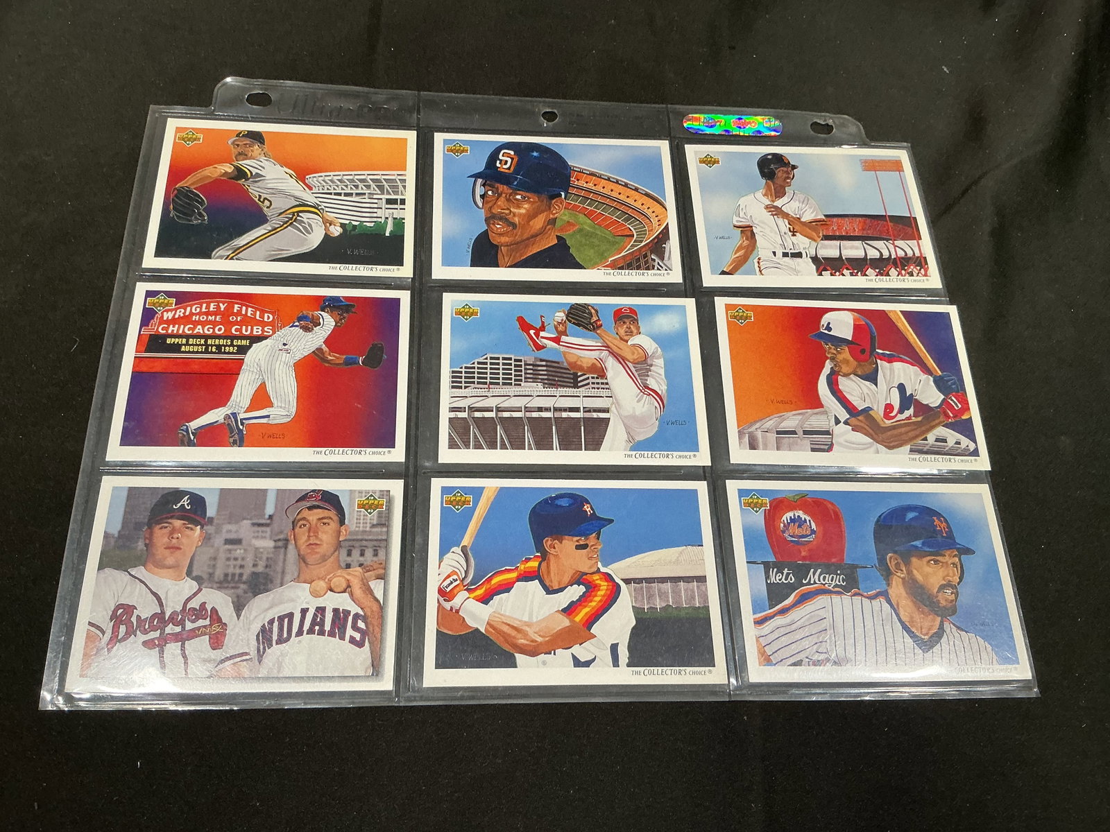 1992 Upper Deck Vernon Wells Baseball Checklist Cards: Nine 1992 Upper Deck baseball checklist cards showcase Vernon Wells' distinctive painted player-and-ballpark artwork across a range of Major League teams. Visible subjects include Howard Johnson, Deli