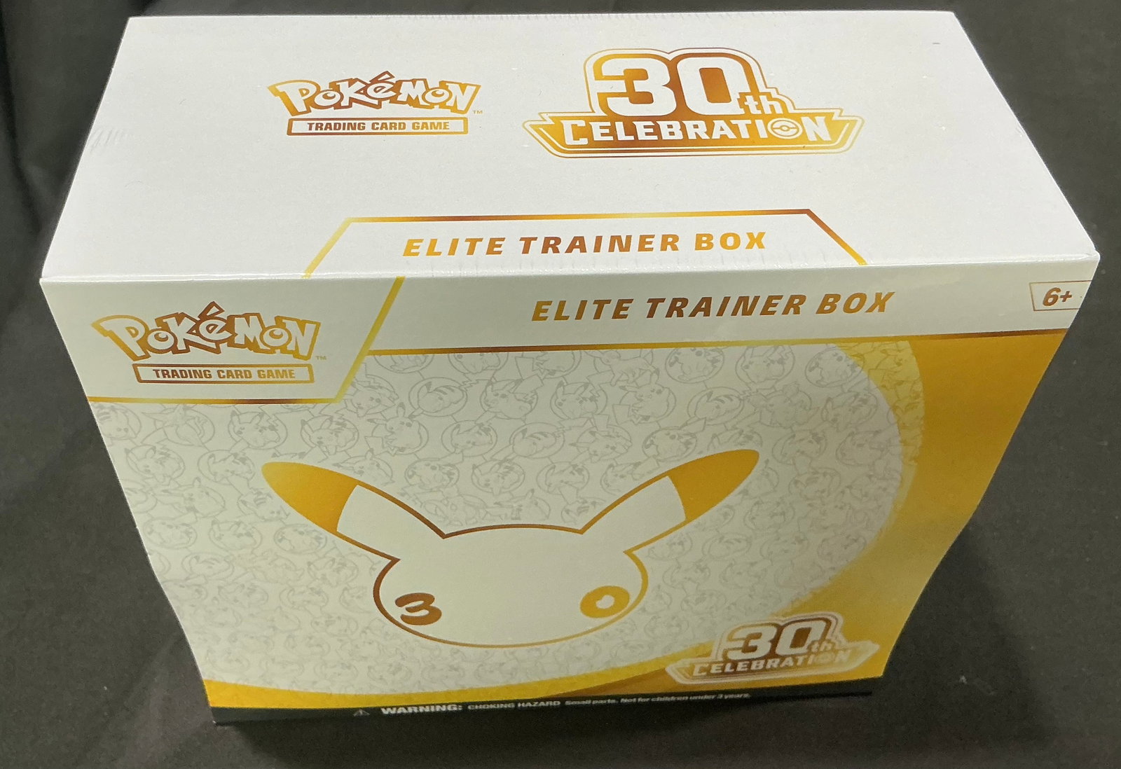 Pokemon 30th Celebration Elite Trainer Box Pikachu Sealed: Offered once more from the newly released Pokemon TCG 30th Celebration lineup, this factory sealed Elite Trainer Box features the distinctive white-and-gold Pikachu anniversary design. The box contain