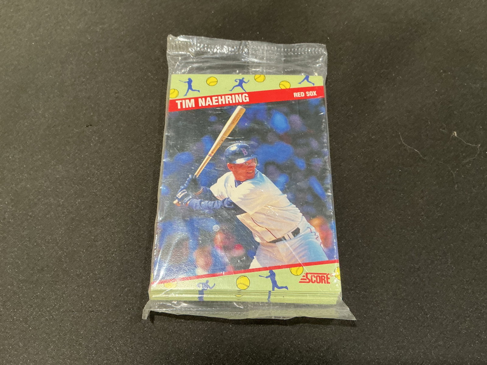 1991 Score NSCC Baseball Promo Set Sealed Tim Naehring: Offered again in its original sealed cello wrapper, this 1991 Score National Sports Collectors Convention baseball promotional set features Tim Naehring of the Boston Red Sox on the front. This