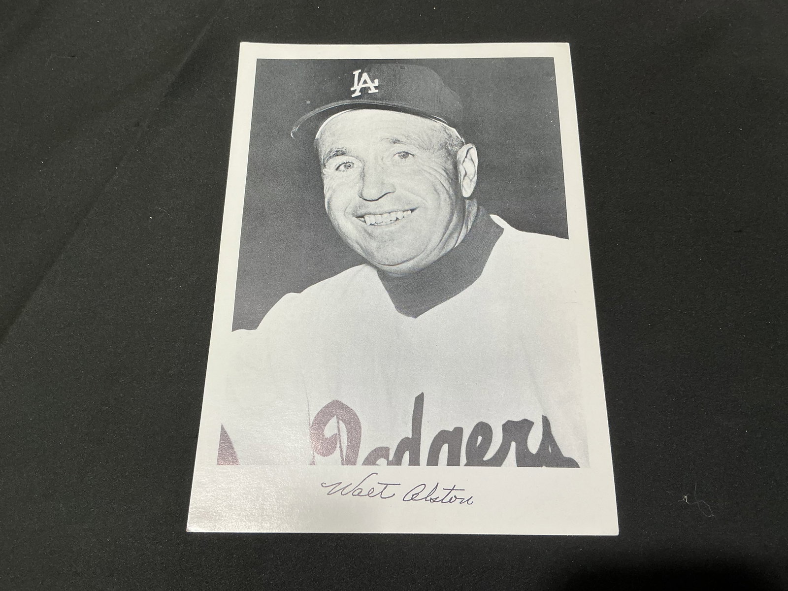 Walt Alston Los Angeles Dodgers Portrait Photo: Offered as a vintage-style black-and-white portrait of longtime Los Angeles Dodgers manager Walt Alston, shown in uniform and cap with his facsimile signature printed beneath the image. Alston
