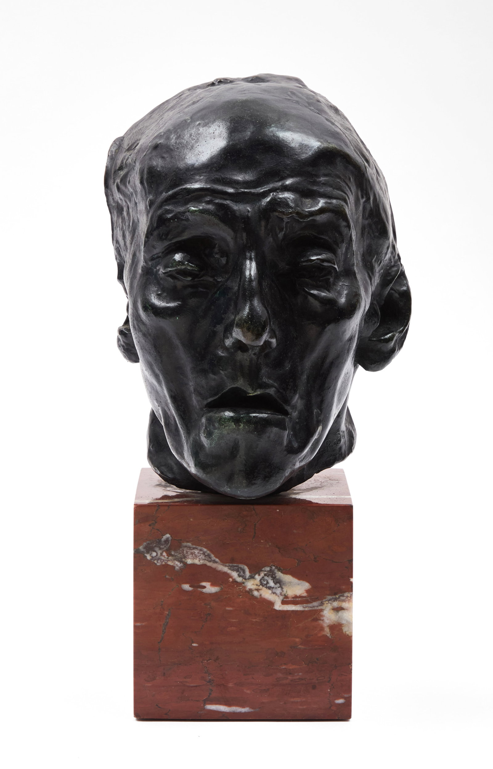 AUGUSTE RODIN - Mask of an Old Man: bronze incised with signature and stamped “Alexis Rudier Fondeur, Paris” Size 12 × 5 × 5 in Medium bronze Provenance Sascha Guitre (sic) Feingarten Galleries, Lo