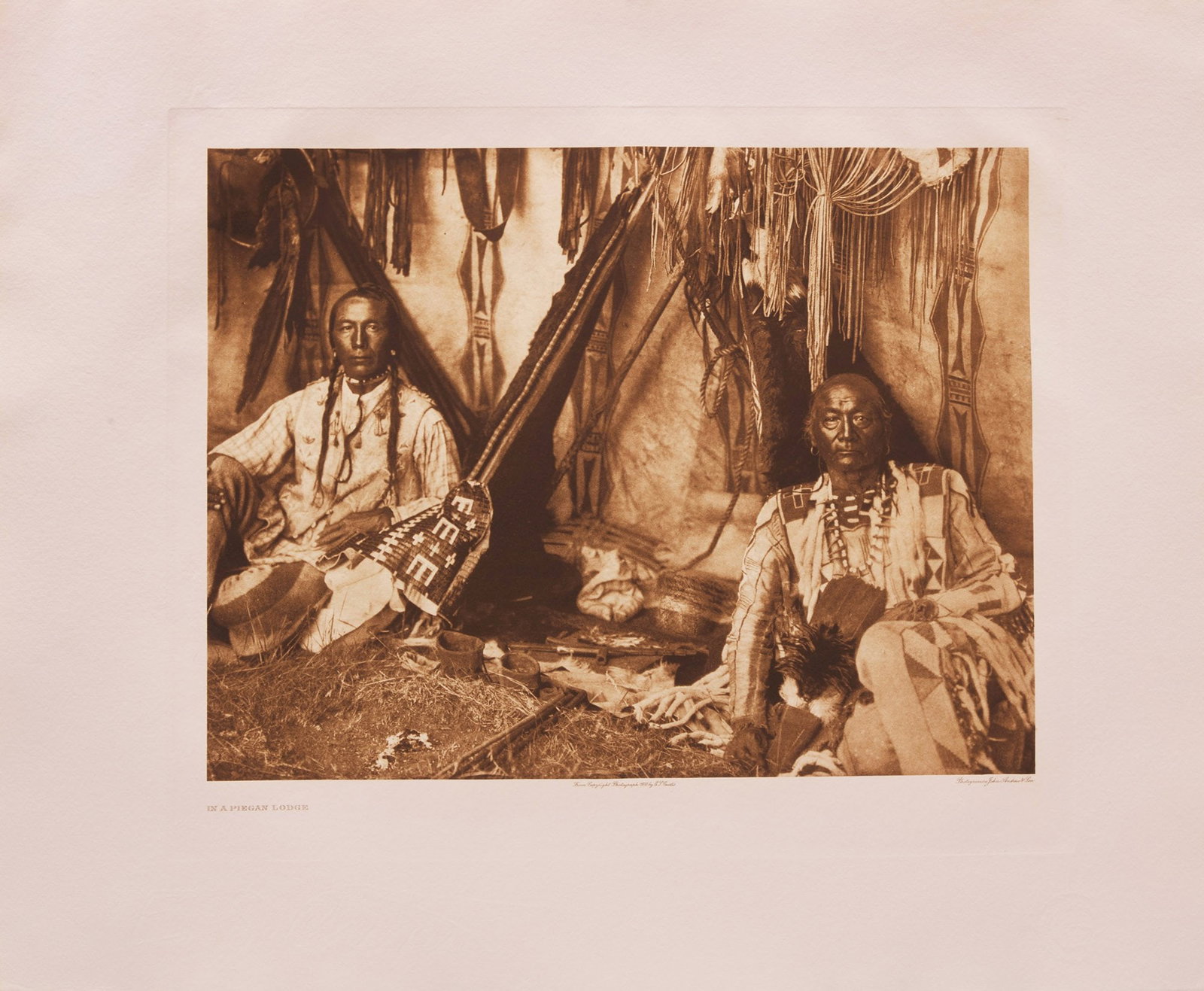 EDWARD S. CURTIS - In a Piegan Lodge and Apsaroke War Group - 2