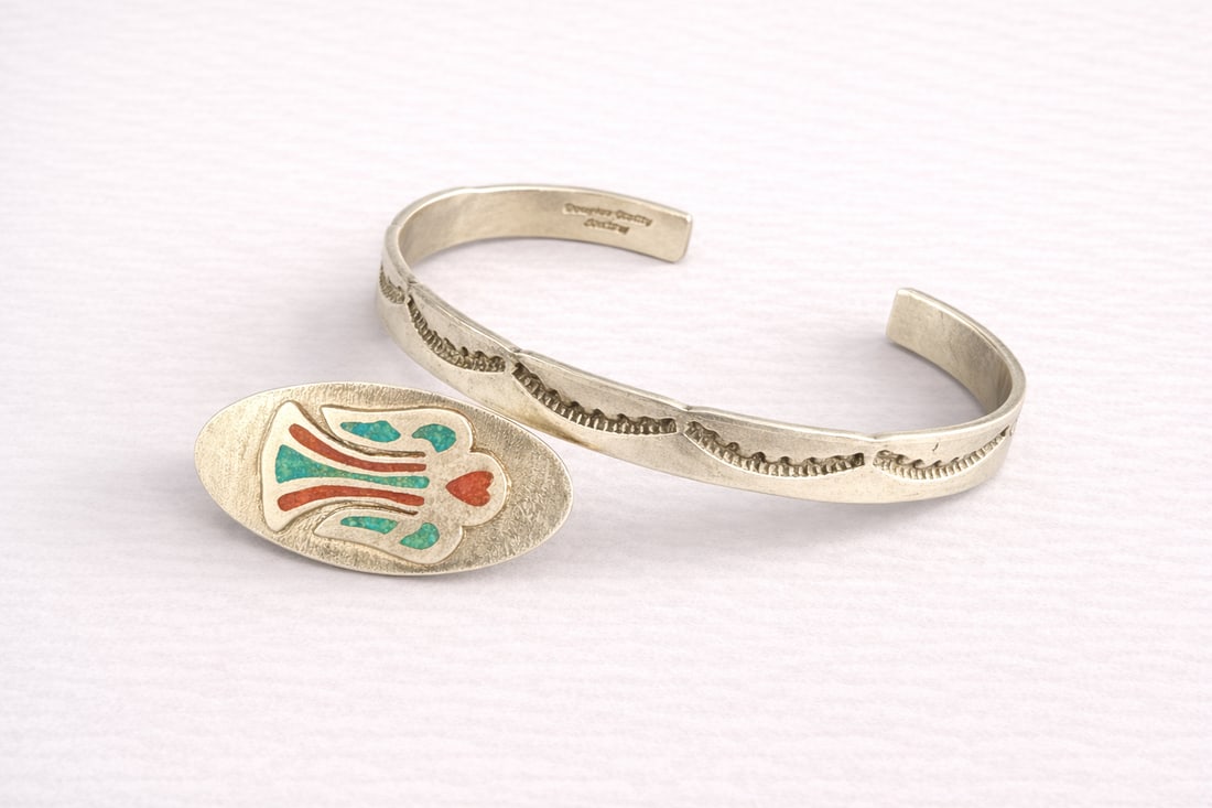 Sterling Silver Bracelet with matching pin / brooch, 22 grams 1950s–1970s: handcrafted sterling silver bracelet and matching pin/brooch set. Features a textured hand-worked design with colorful inlay accents. Marked sterling and handcrafted. Unique artisan-style jewelry,