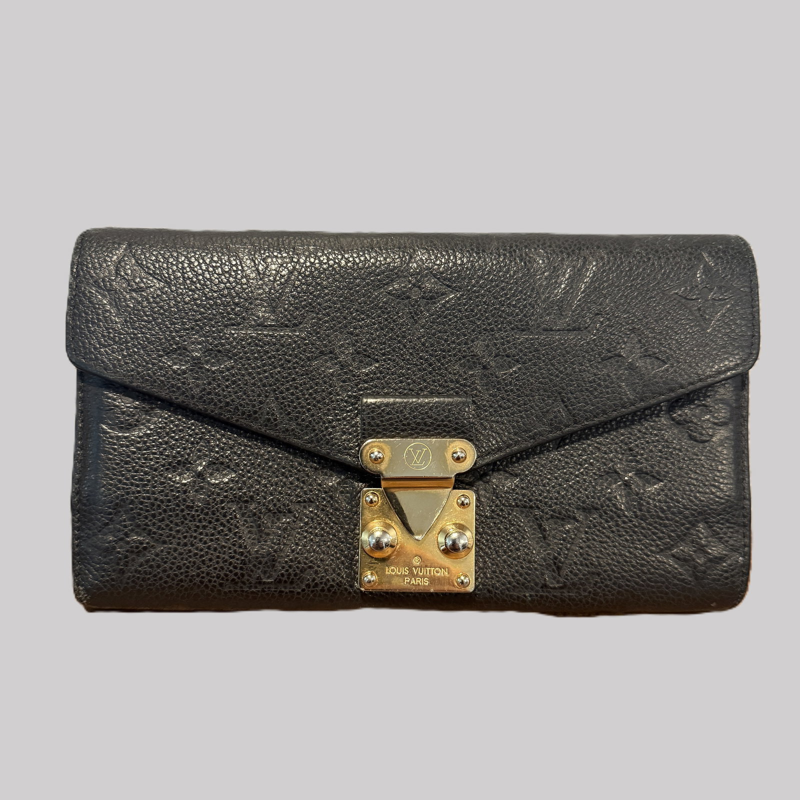Louis Vuitton Empreinte Black Leather Long Wallet Clutch LV Lock: Authentic Louis Vuitton Empreinte leather long wallet/clutch in black. Features embossed monogram and gold-tone LV lock closure. Good pre-owned condition with normal wear.